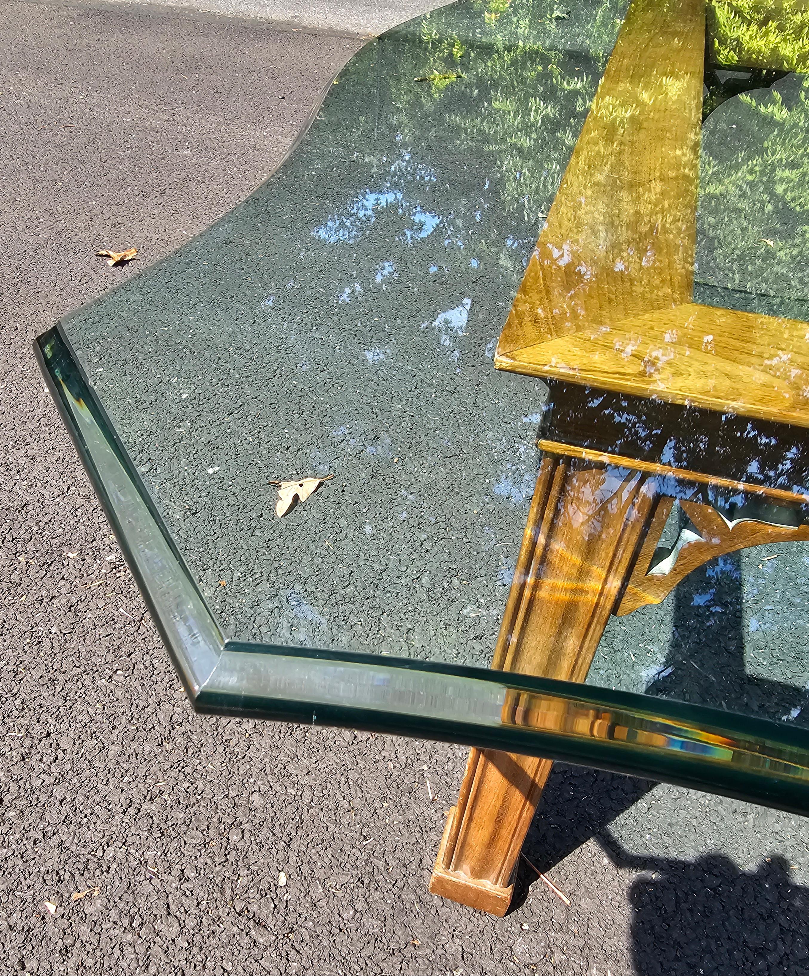 A Stickley contemporary Chippendale  Walnut and tempered  and Ogee glass top cocktail / coffee table. Measures 38