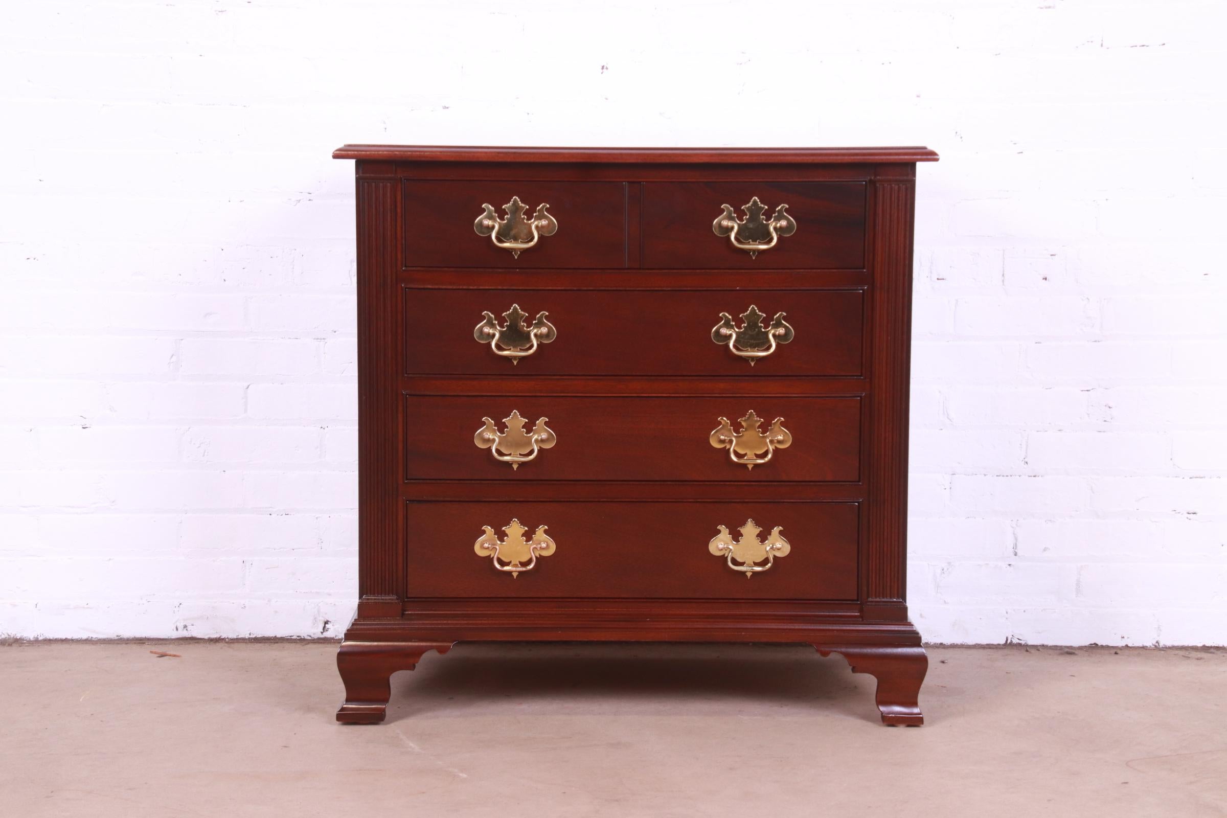 An exceptional Georgian or Chippendale style four-drawer dresser or chest of drawers

By Stickley, 