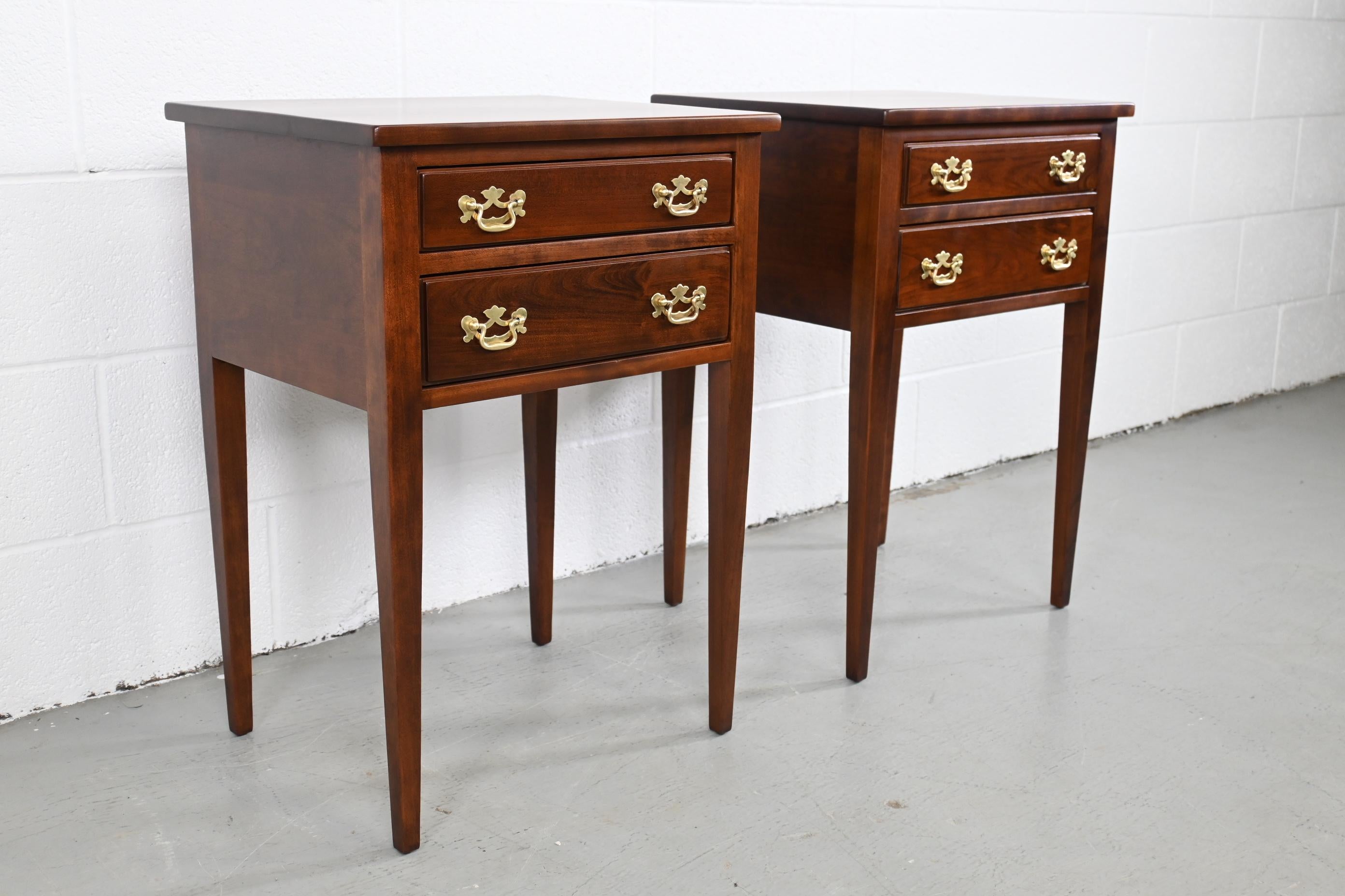 Leopold Stickley Federal cherry end tables or nightstands

Stickley Furniture, USA, 1950s

Measures: 19 Wide x 16 Deep x 27.25 High.

Solid cherry Federal style two drawer end tables with tapered legs and brass pulls.

Professionally