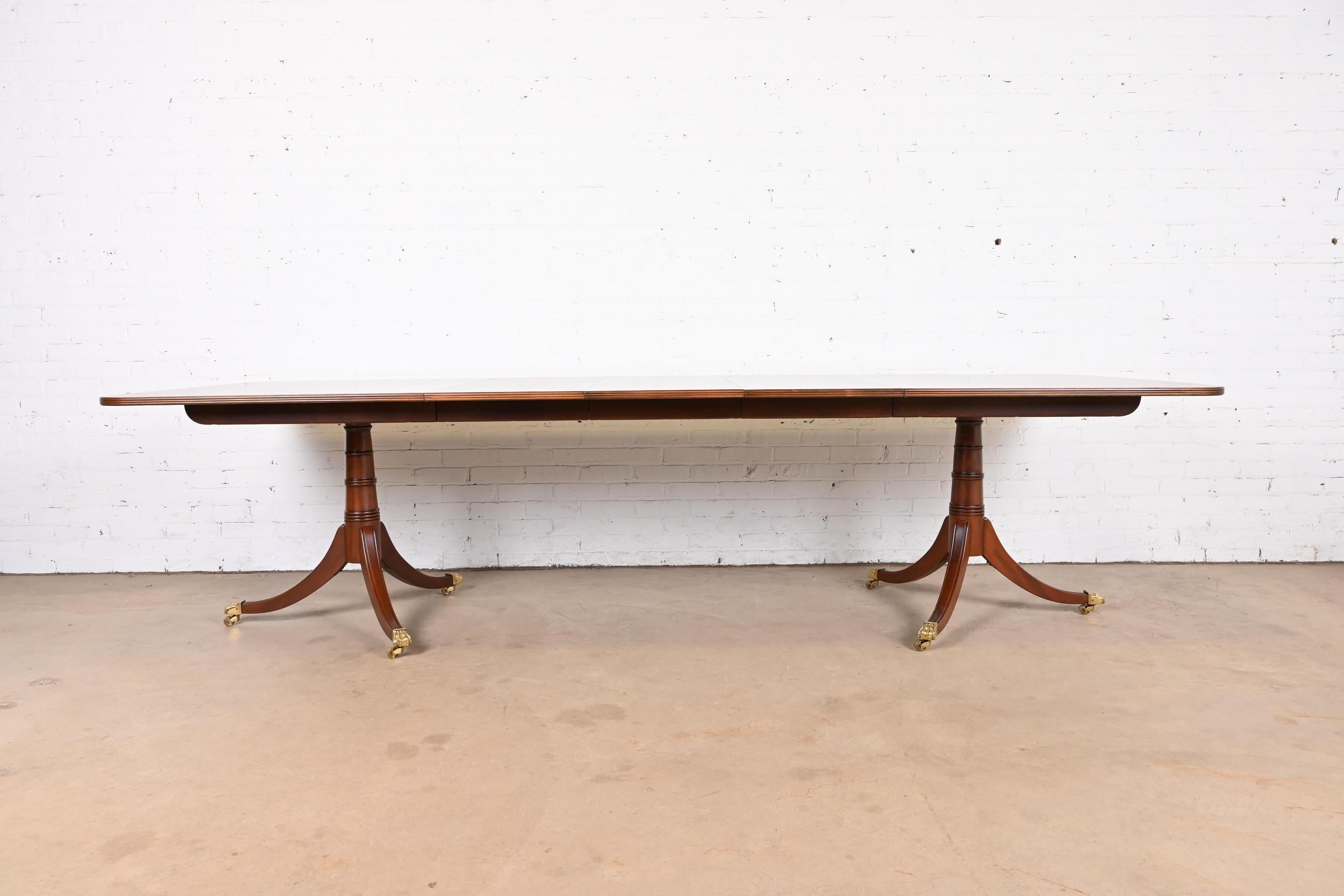20th Century Stickley Georgian Banded Flame Mahogany Double Pedestal Extension Dining Table