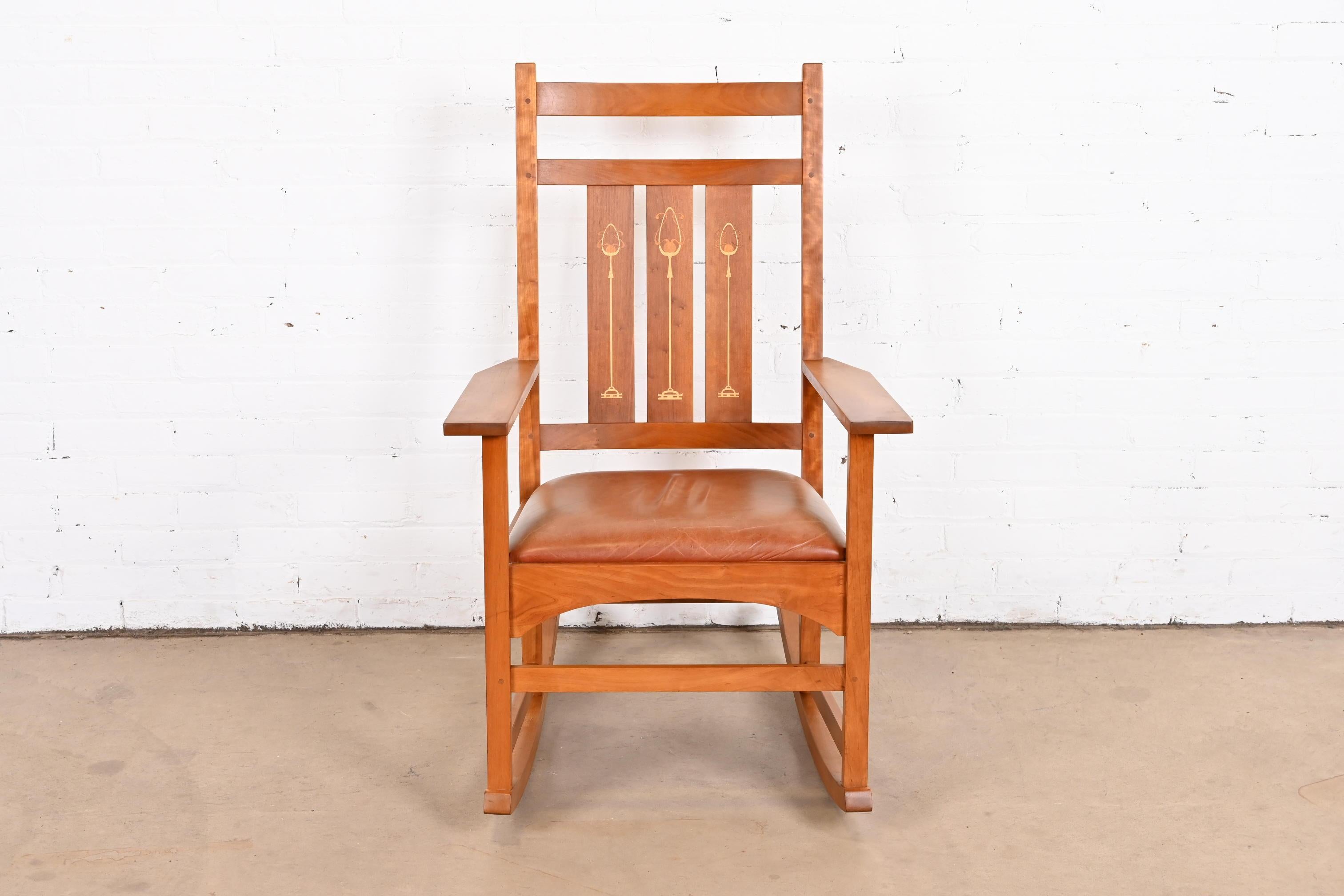 A gorgeous Mission or Arts & Crafts style rocking chairs

By L. & J.G. Stickley, 