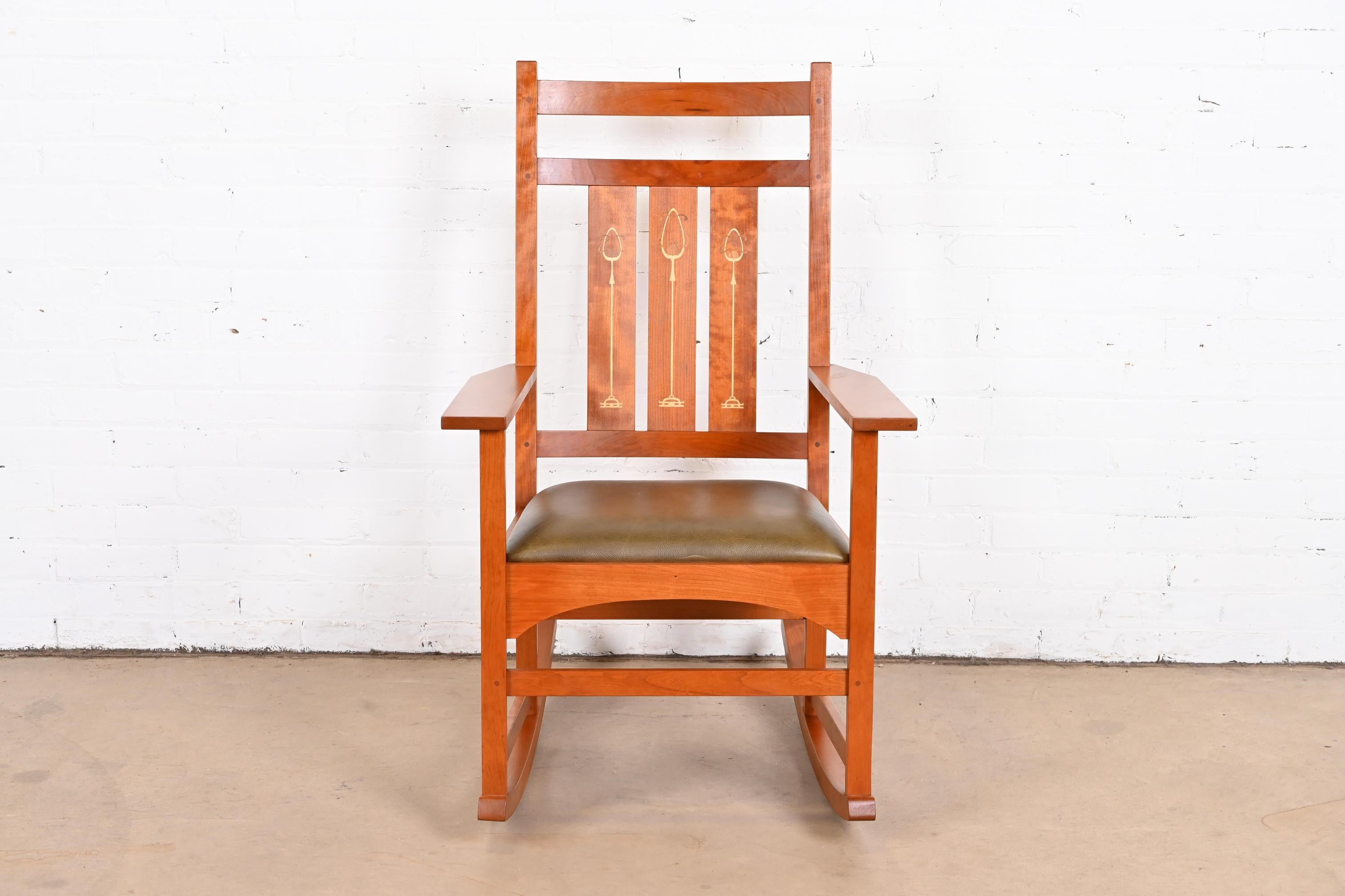A gorgeous Mission or Arts & Crafts style rocking chairs.

By L. & J.G. Stickley, 