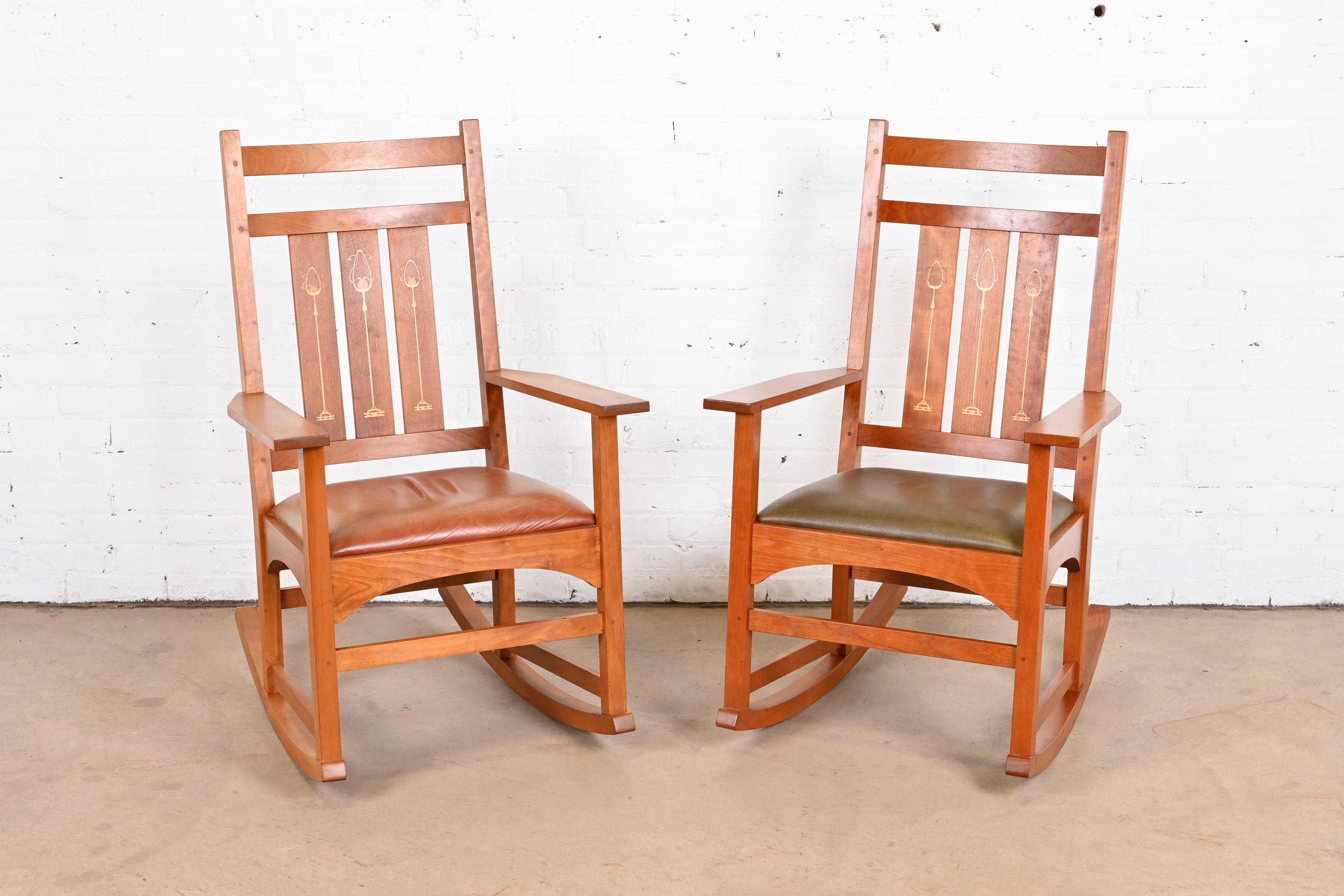 A gorgeous pair of Mission or Arts & Crafts style rocking chairs

By L. & J.G. Stickley, 