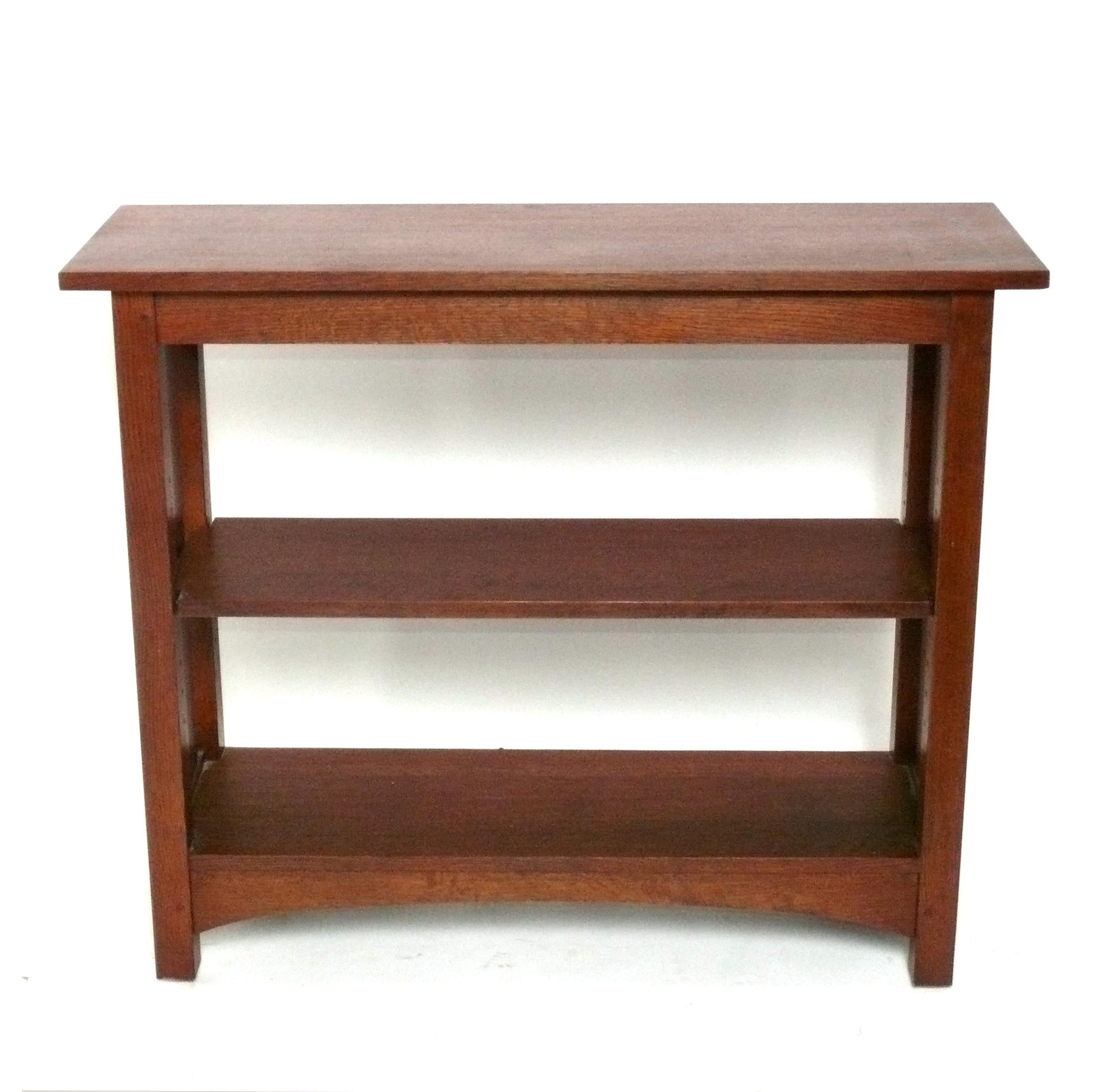 Clean Lined Mission Oak Bookcase, designed by Harvey Ellis for Stickley, originally designed in the 1910s, this is example was made by Stickley in the 1990s. Retains the Stickley label underneath. This piece is a versatile size and can be used as a