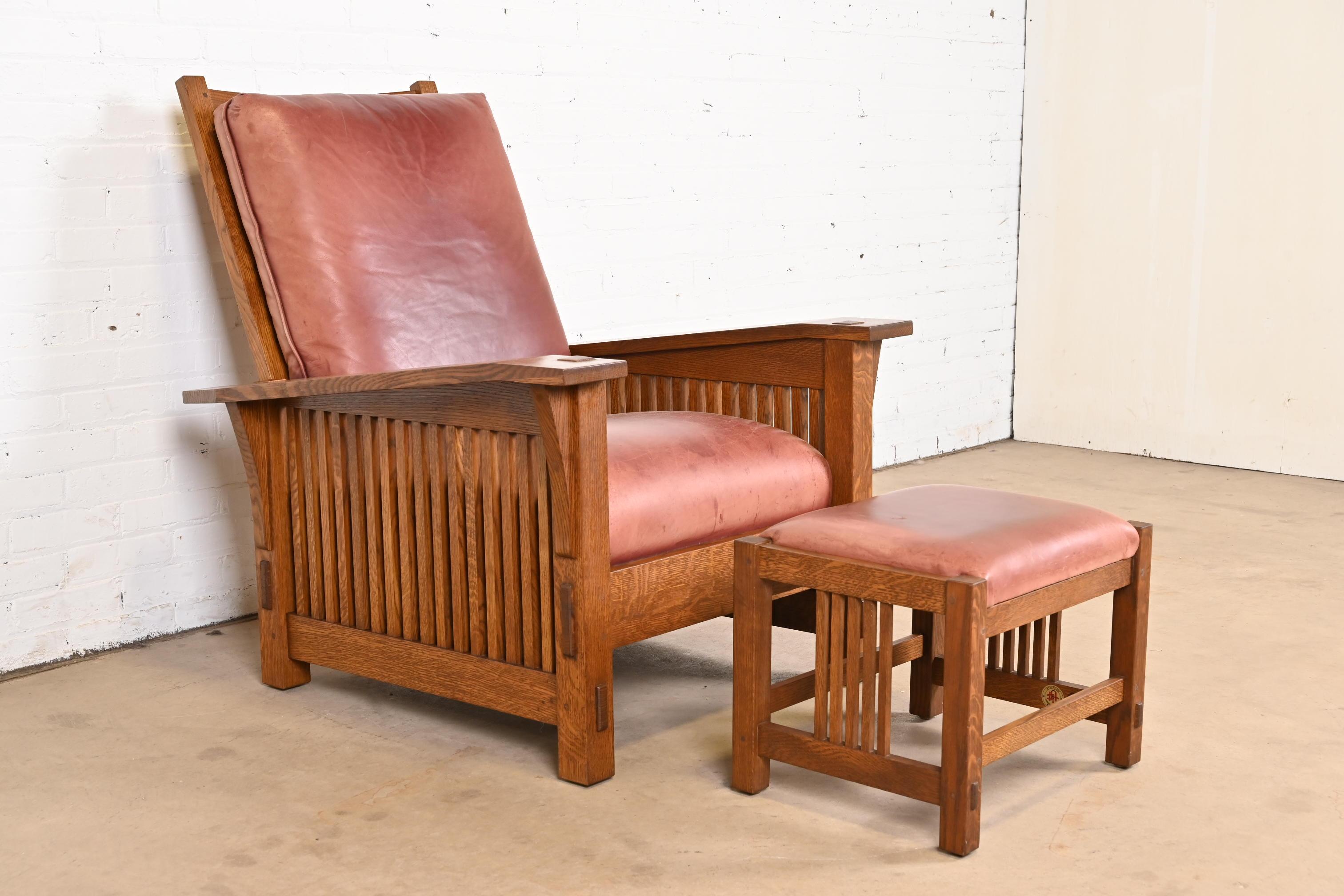 A gorgeous Mission or Arts & Crafts Morris reclining lounge chair and ottoman

By Stickley

USA, Late 20th Century

Carved oak frame, with burgundy leather upholstery.

Measures:
Chair: 32.75
