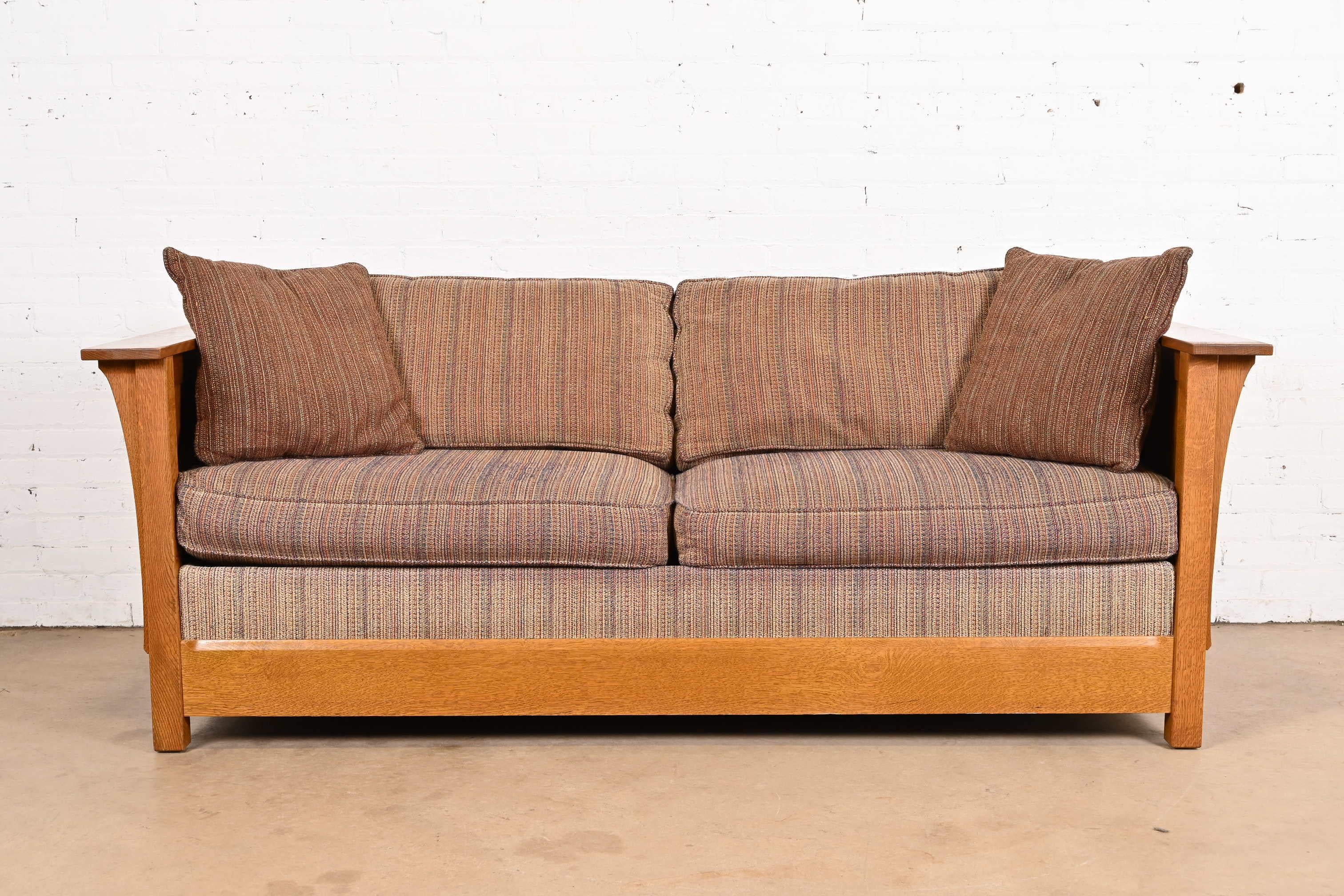 A gorgeous Mission, Arts & Crafts, or Prairie style full size sleeper sofa or loveseat

By Stickley

USA, Circa Late 20th Century

Solid quarter sawn oak frame, with original upholstery.

Measures: 81.75