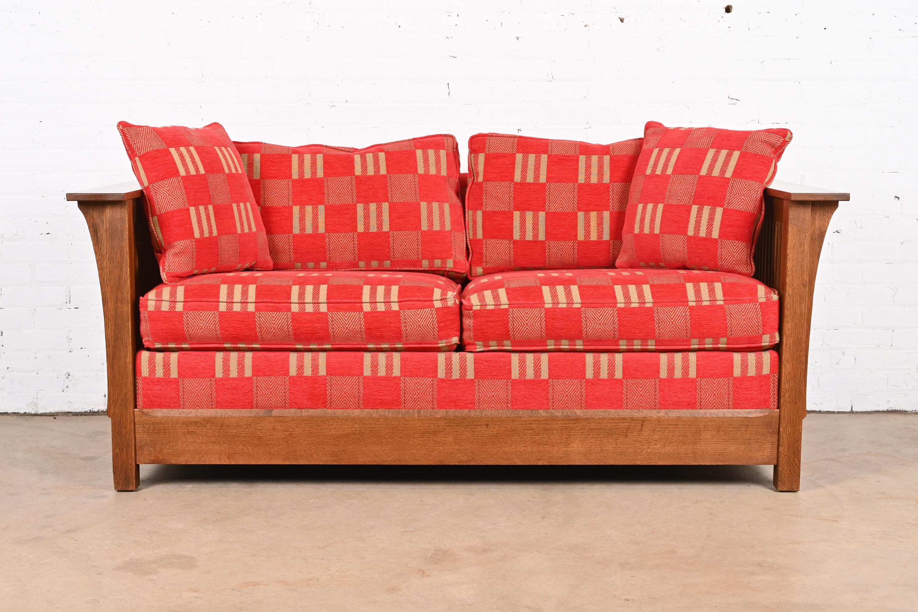 A gorgeous Mission or Arts & Crafts style full size sleeper sofa or loveseat

By Stickley

USA, Circa Late 20th Century

Solid quarter sawn oak frame, with geometric red chenille upholstery.

Measures: 73