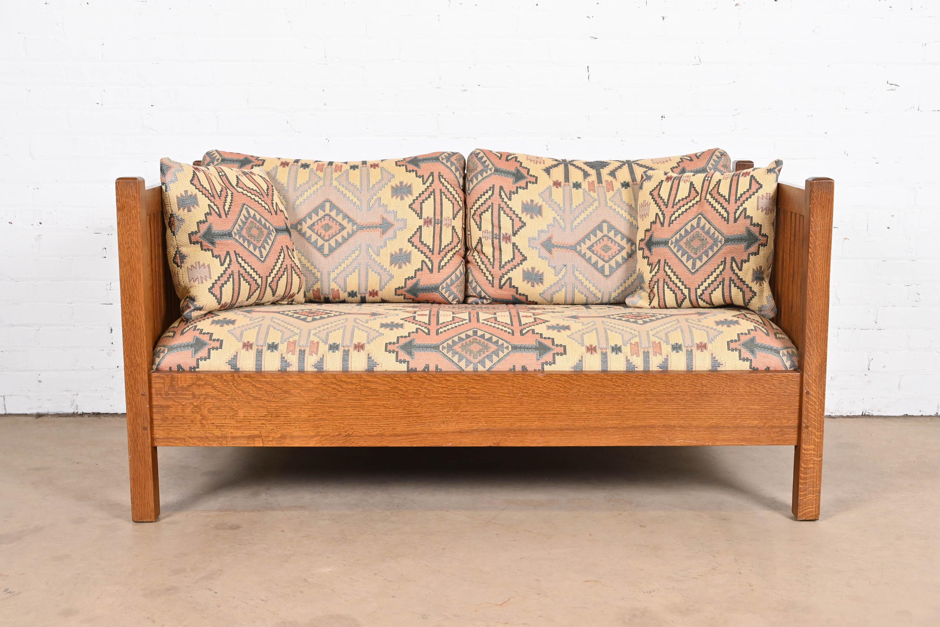 A gorgeous Mission or Arts & Crafts style sofa or loveseat

By Stickley

USA, Circa Late 20th Century

Solid quarter sawn oak frame, with original Southwest style upholstery.

Measures: 60.25