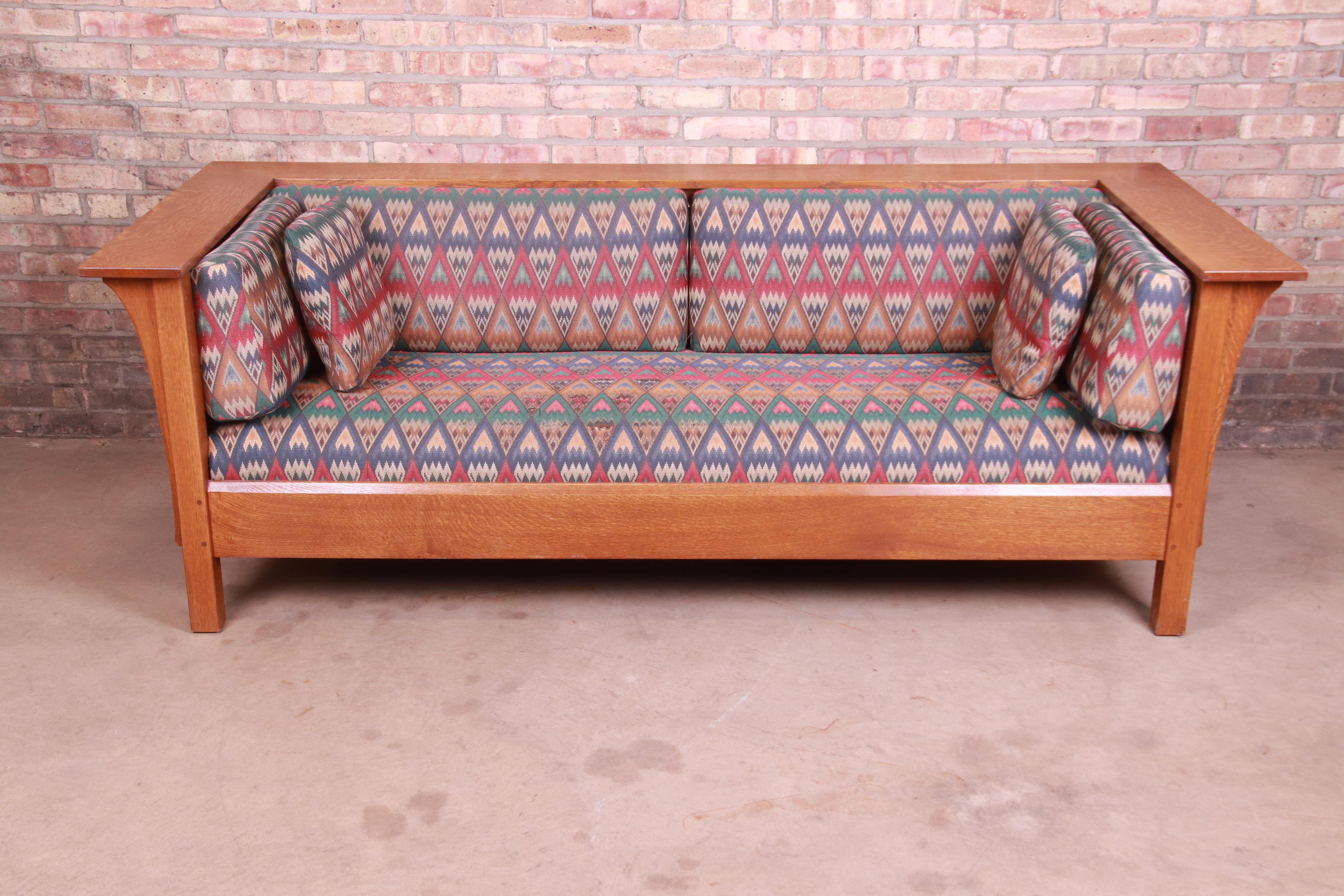 A gorgeous Arts & Crafts style sofa

By L. & J.G. Stickley,

USA, Circa 1990s

Solid quarter sawn oak frame, with down-filled cushions in a Southwest patterned upholstery.

Measures: 84.5