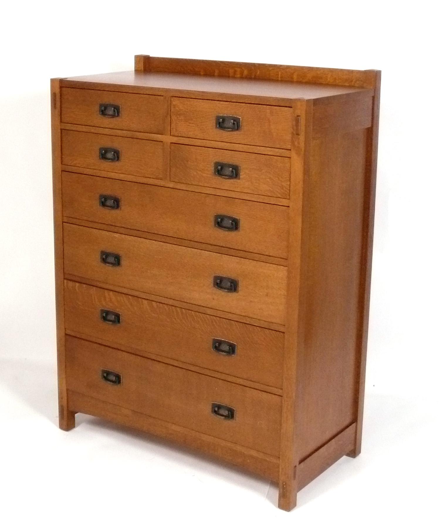 Clean Lined Stickley Tall Chest or Dresser, originally designed in the 1910s by Gustav Stickley, this example is part of the authorized line produced by Stickley in the 2000s. Like all Stickley furniture, this piece is extremely well made with