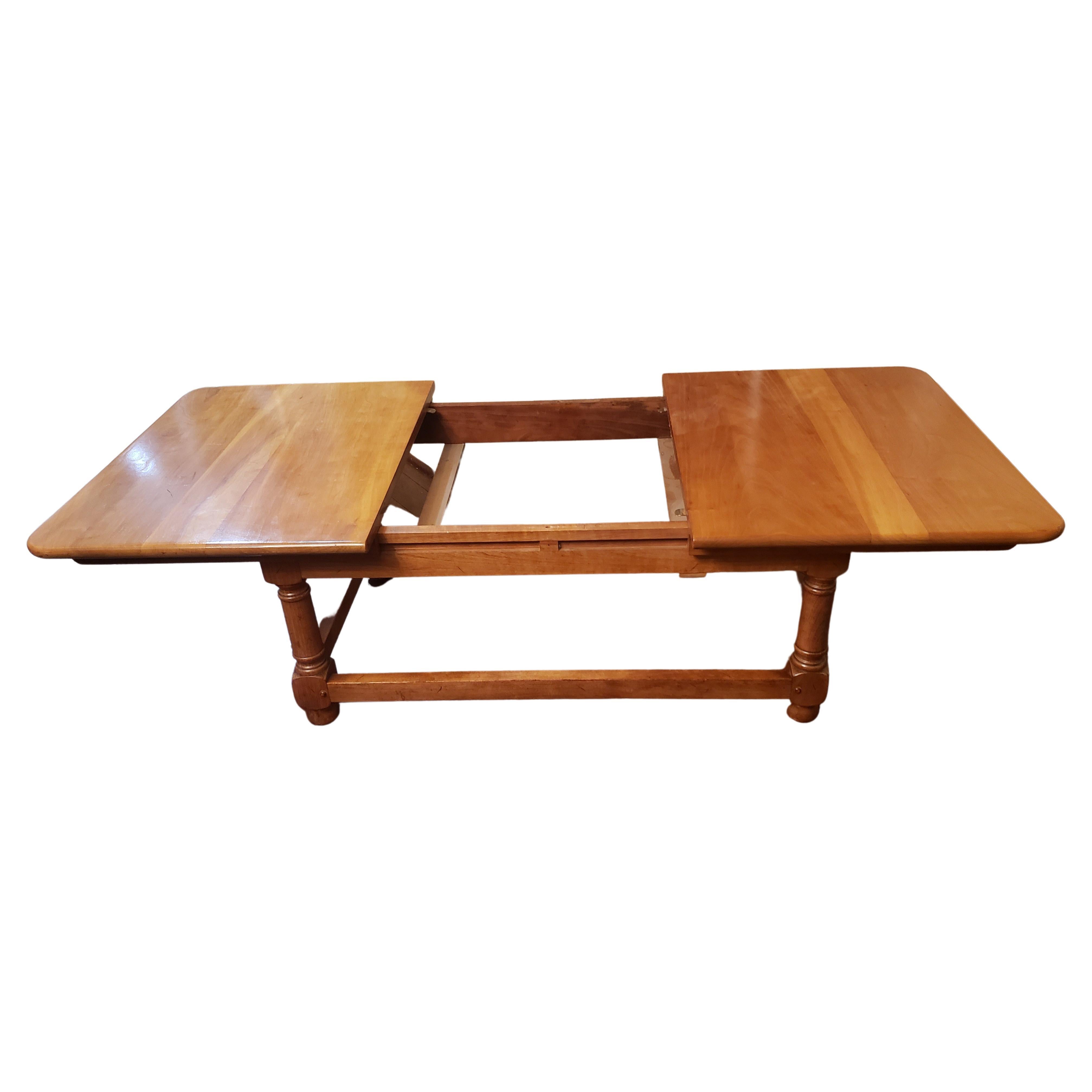 This stickley solid maple extending coffee tray table is very unique piece. It is from Stickley's Cherry Valley Collection 1958. 
 It has a hidden compartment with a serving tray / Leaf, that is also used to expand the table from 38