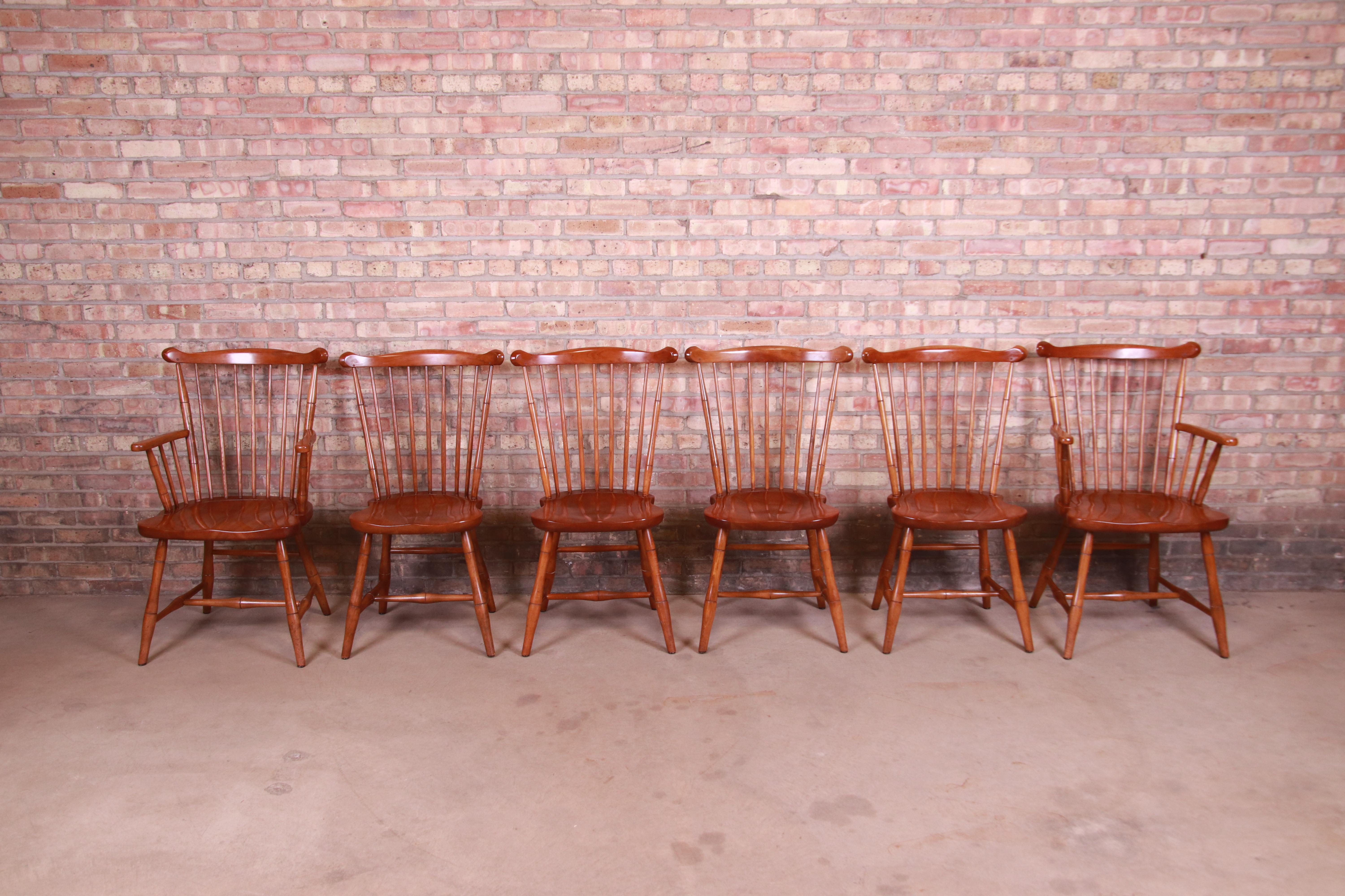 A gorgeous set of six American Colonial style solid maple spindle back Windsor dining chairs

By L. & J.G. Stickley

USA, Circa 1950s

Armchairs: 22.25
