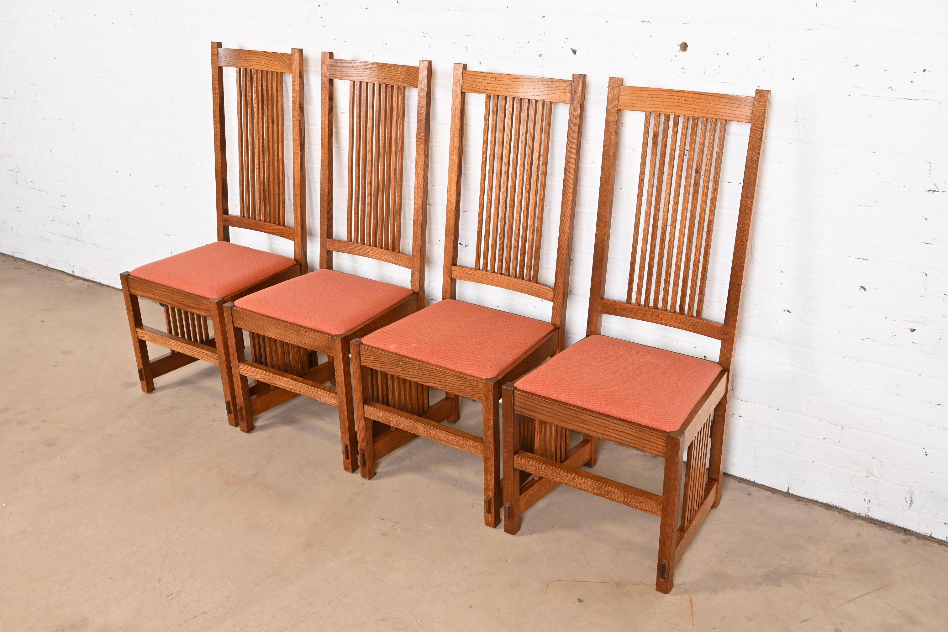 An exceptional set of four Mission or Arts & Crafts style high back spindle dining chairs

In the manner of L. & J.G. Stickley

USA, Late 20th Century

Solid quarter sawn oak frames, with upholstered seats.

Measures: 19