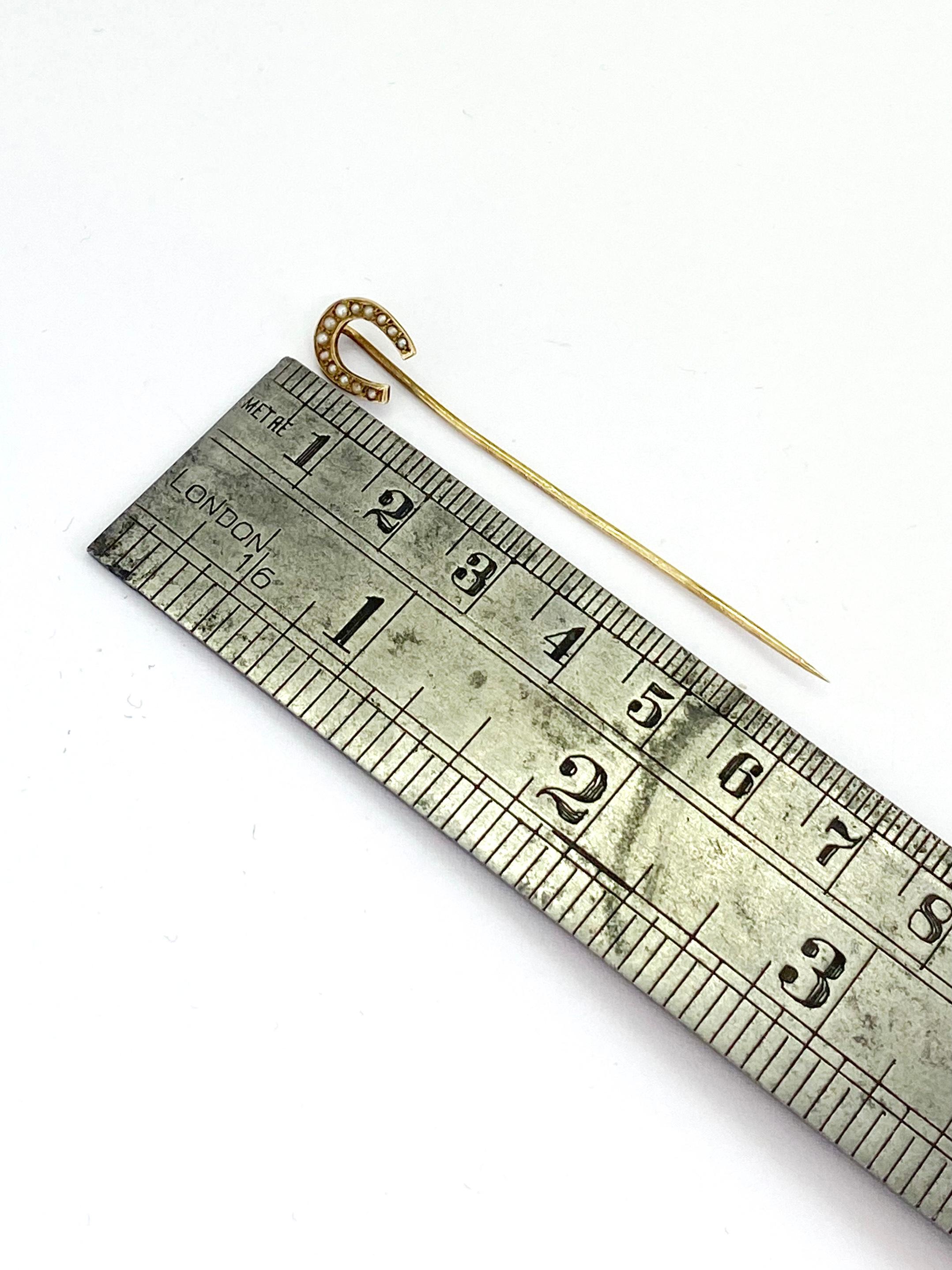Stickpin 14 Karat Yellow Gold and Pearl.
I don't know where it's done.
Stamp 14K