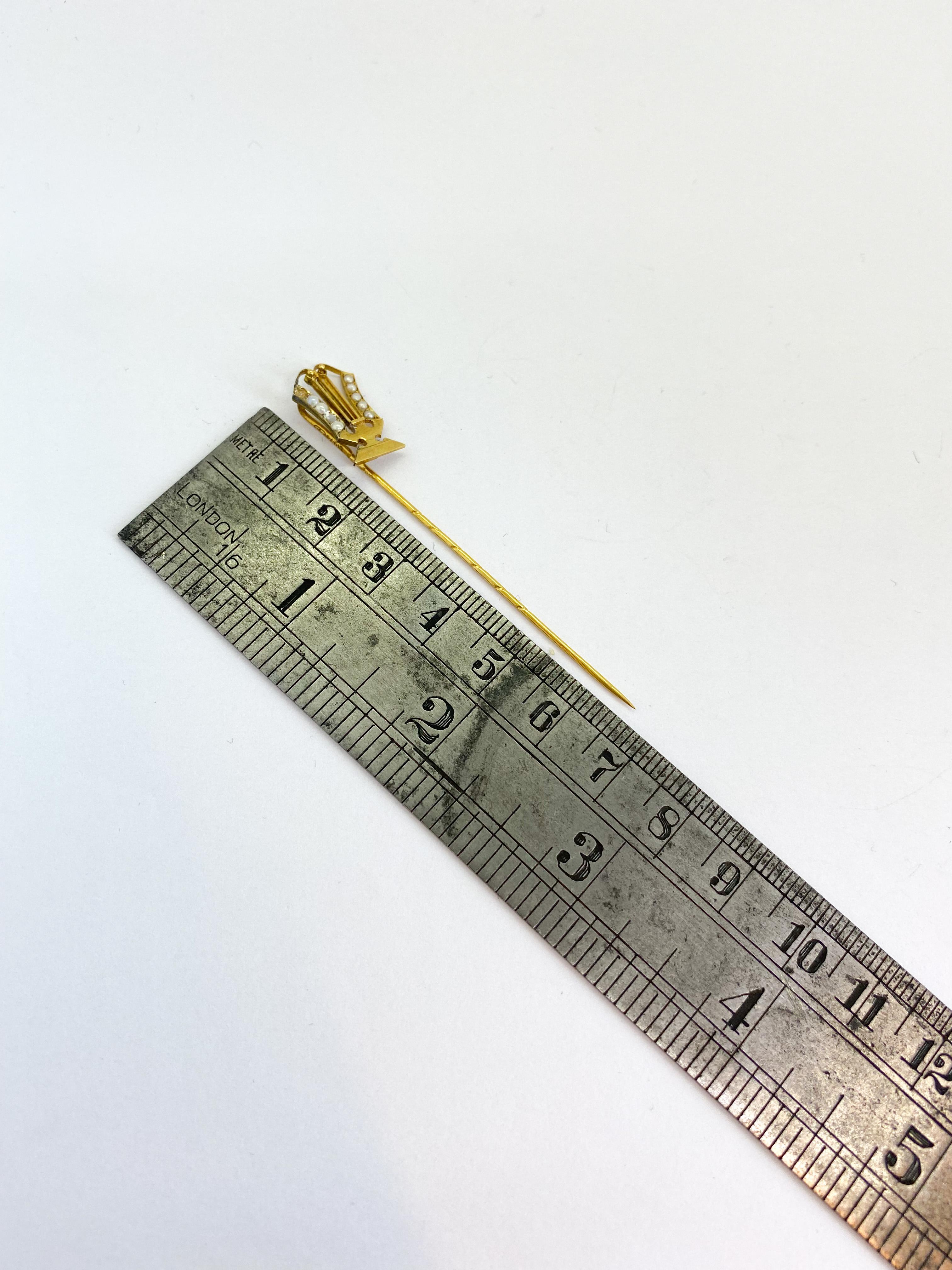 Stickpin 18 Karat Yellow Gold and Pearl
750 Gold stamp.
Possibly made in Helsinki.
Lots of stamps.
Checkmark Finland.