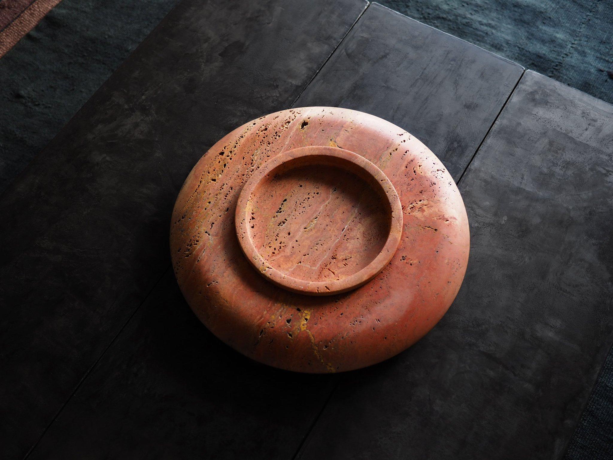 The Stieglitz vessel, a natural stone heirloom in unfilled travertine. A low-slung sculptural form of two components, vessel & bowl. The finish is left unfilled, celebrating the beauty & porosity of the natural stone. The most desirable pieces