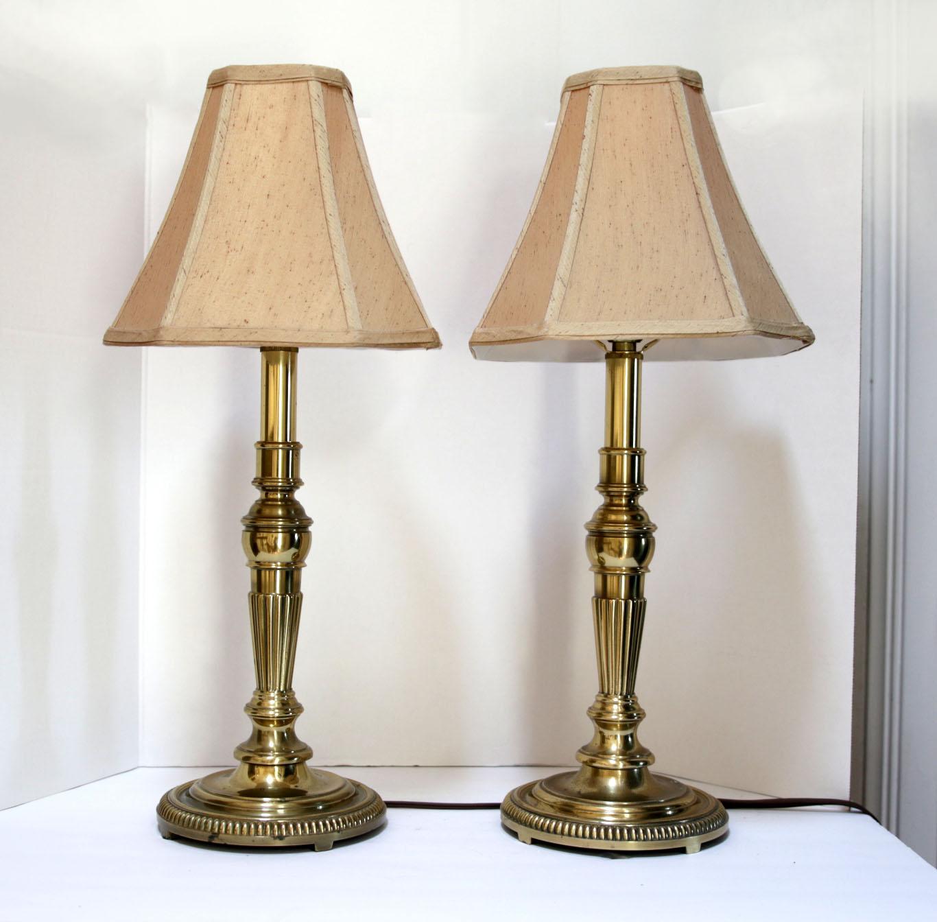 Stiffel craftsmanship and style make this pair of buffet or console table lamps a design tour de force. Form meets function in this pair. They are lovely and will light the way on a console table or a splendid buffet presentation. The lamps have a