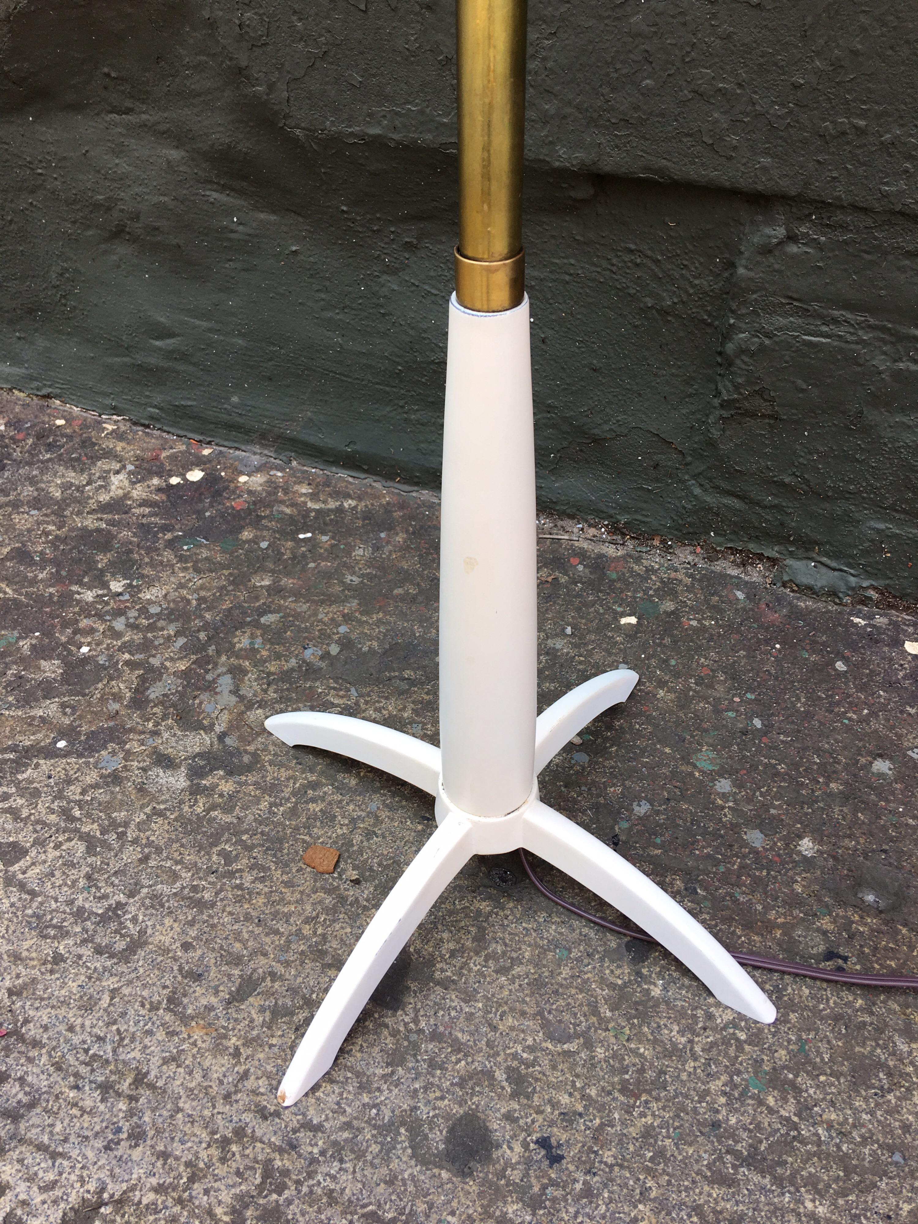 Stiffel floor lamp with original Maria Kipp shade. Brass pole with cream colored painted claw-foot base. Maria Kipp shade has several broken tips to woven sticks. Overall presents very well.