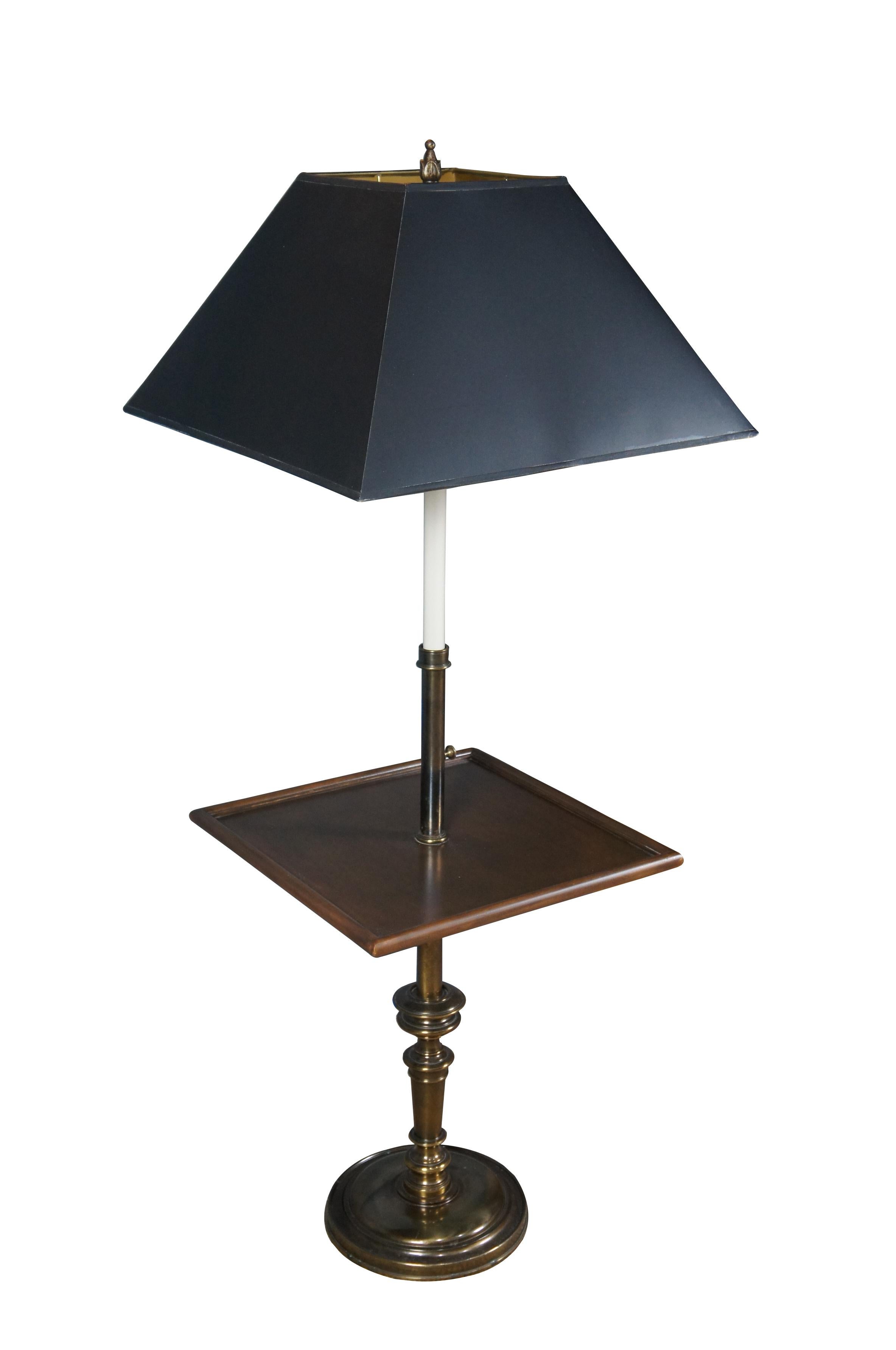 Mid century Stiffel floor lamp made of brass featuring square wood side table and candlestick design.

Dimensions:
17