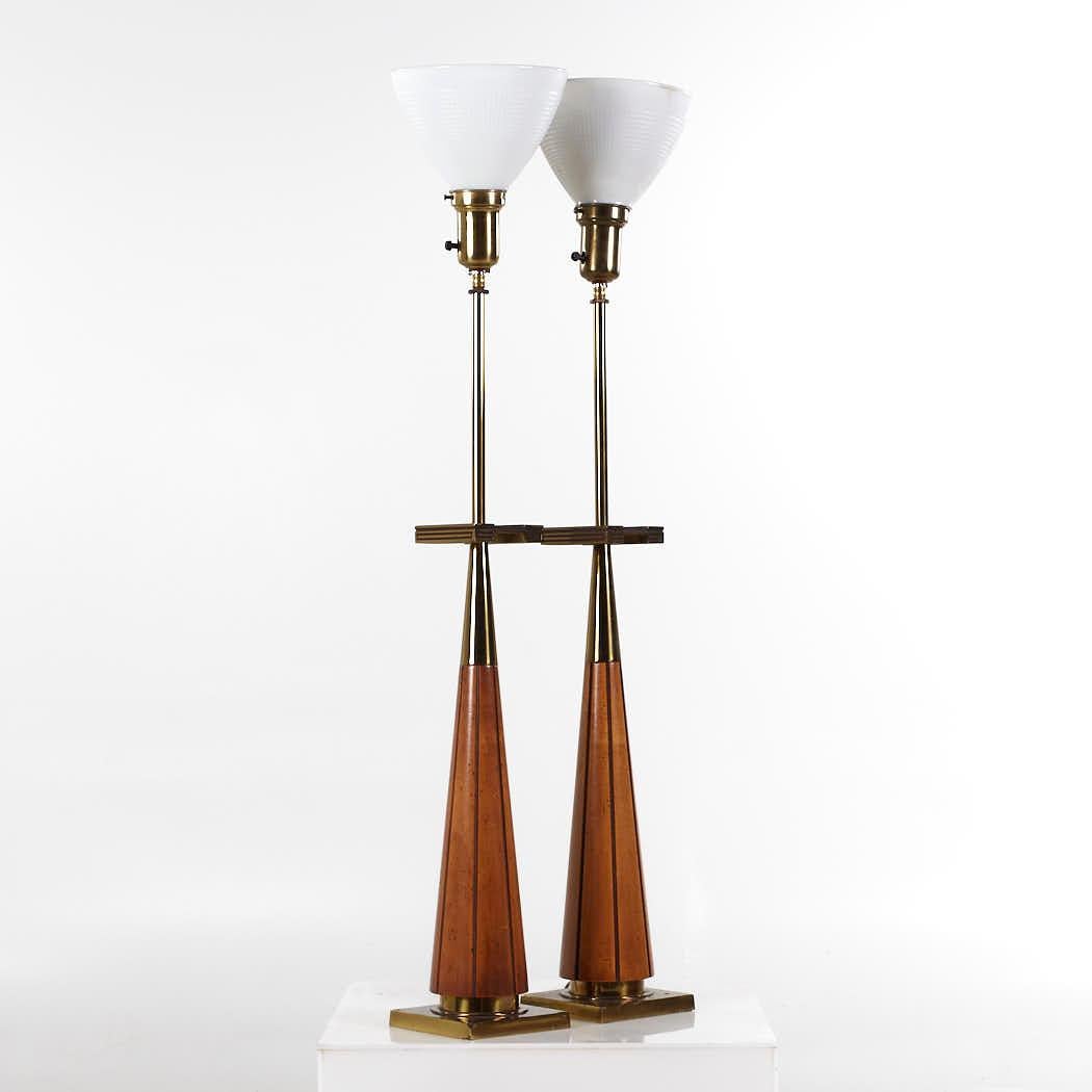 Stiffel Mid Century Walnut and Brass Lamps - Pair

Each lamp measures: 8 wide x 8 deep x 42.5 inches high

We take our photos in a controlled lighting studio to show as much detail as possible. We do not photoshop out blemishes. 

We keep you fully