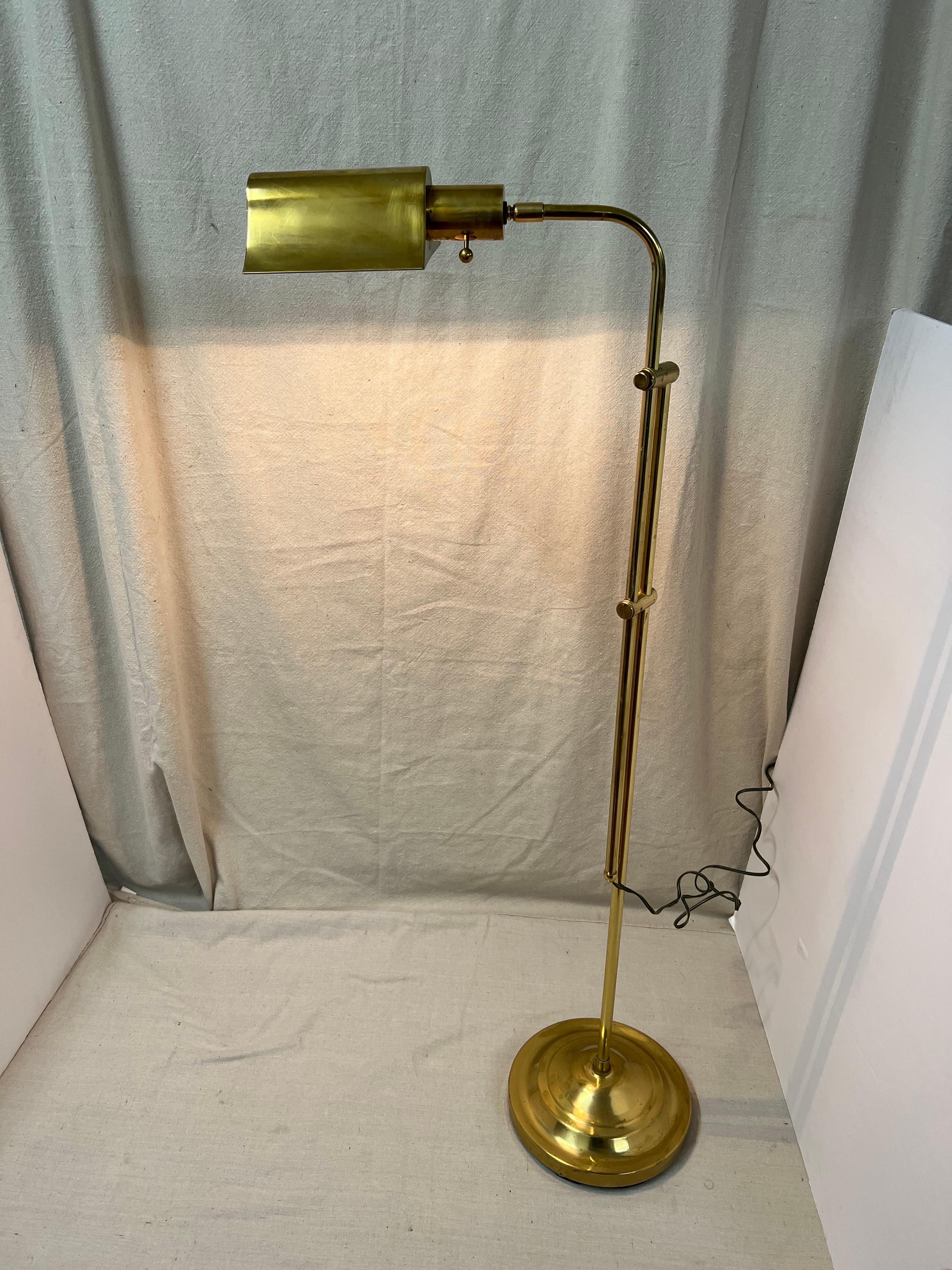 Stiffell style brass pharmacy floor lamp. Adjustable height and swivel neck. Perfect as a reading lamp.

Please check dimensions and ask for more photos before purchase.