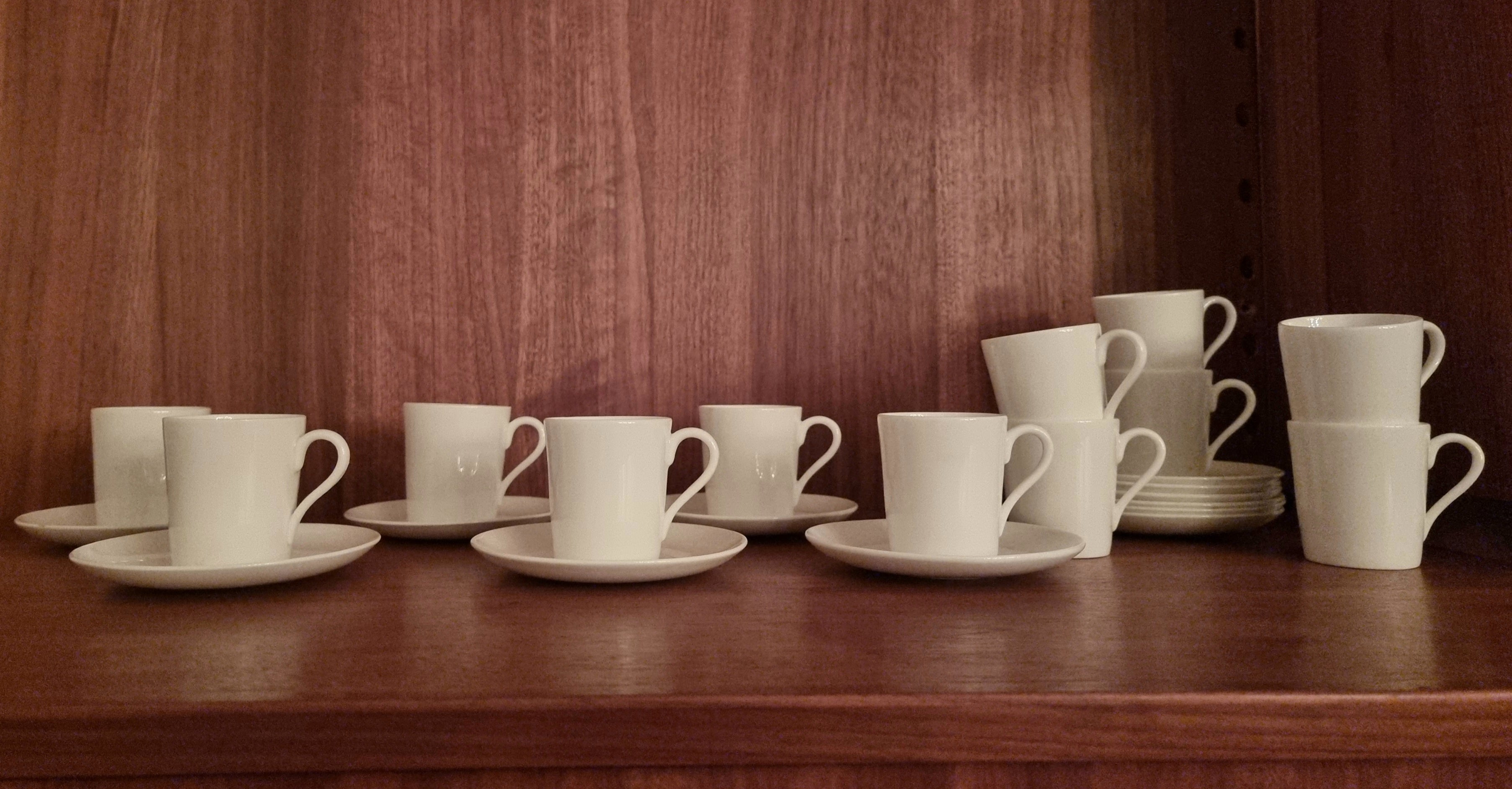 A rare beautiful espresso set 10 cups + 10 saucers + 4 pieces  (ten in good condition, four with smaller dents, one with dents and smaller crack). Designed by Stig Lindberg (1916-1982), swedish artist and industrial designer. Artistic leader at