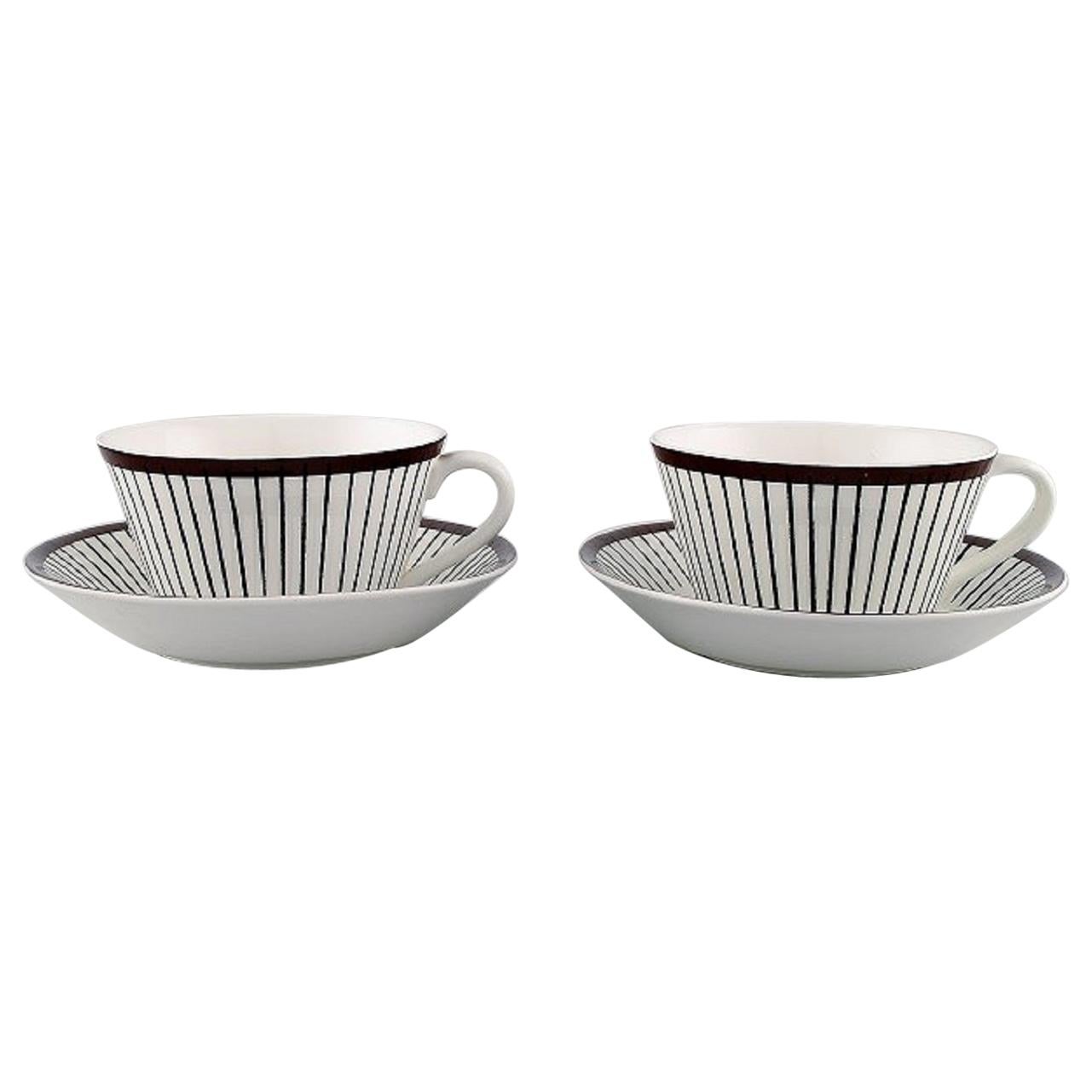 Stig Lindberg for Gustavsberg, a Pair of "Spisa Ribb" Tea Cups with Saucers