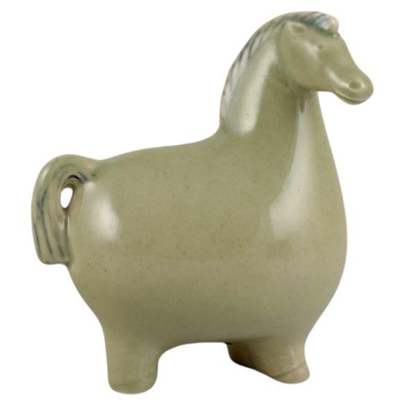 Stig Lindberg for Gustavsberg. Ceramic horse figurine with light green glaze.