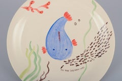 Stig Lindberg for Gustavsberg. Löja plate. Hand-painted with a fish motif.
