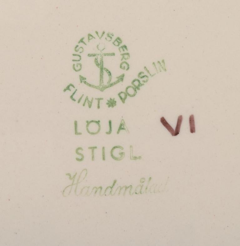 Swedish Stig Lindberg for Gustavsberg. Löja plate, hand-painted with a fish motif For Sale
