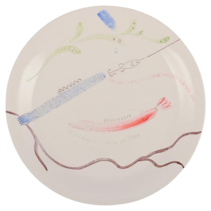 Stig Lindberg for Gustavsberg. "Löja" plate. Hand-painted with a fish motif.  For Sale