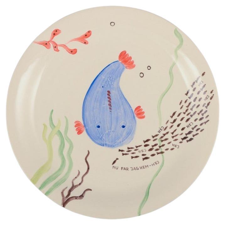 Stig Lindberg for Gustavsberg. Löja plate. Hand-painted with a fish motif. For Sale