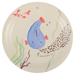 Stig Lindberg for Gustavsberg. Löja plate. Hand-painted with a fish motif.