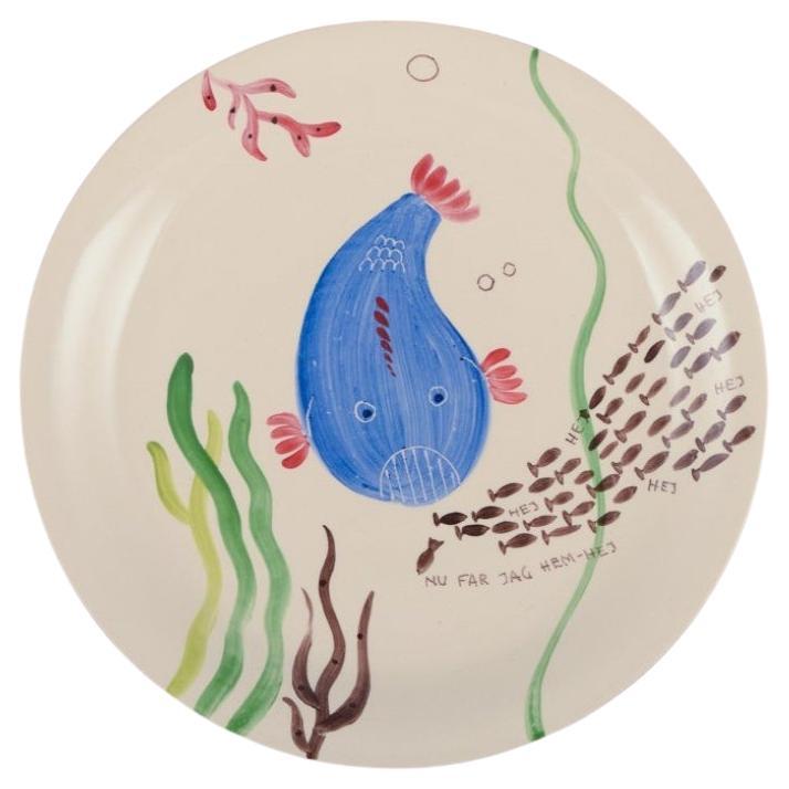 Stig Lindberg for Gustavsberg. Löja plate, hand-painted with a fish motif For Sale