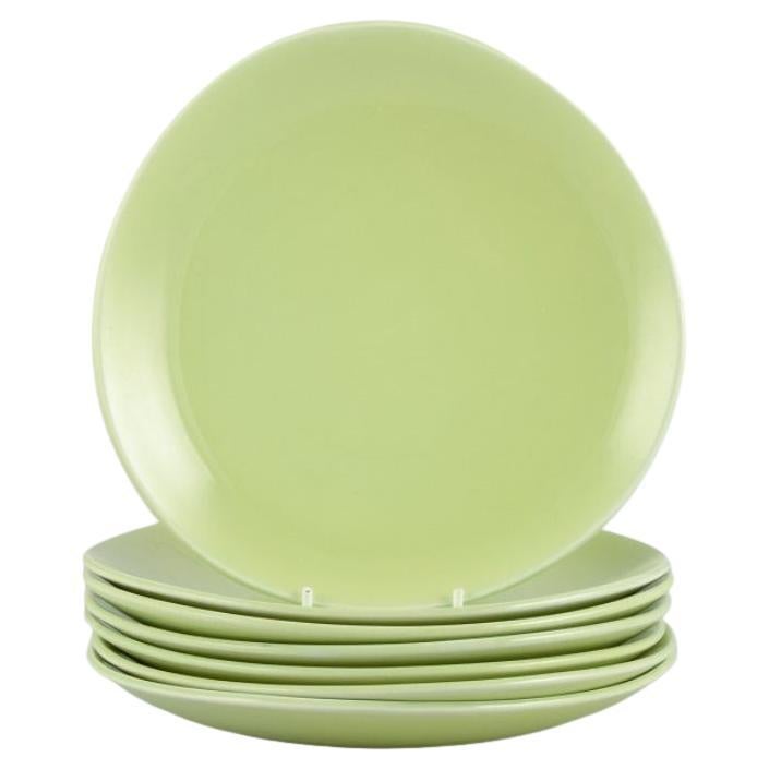 Stig Lindberg for Gustavsberg. Set of seven "Colorado" porcelain plates in green For Sale