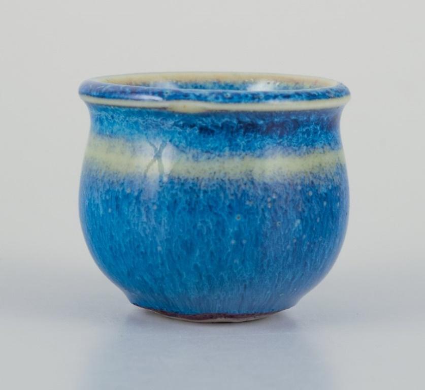 Scandinavian Modern Stig Lindberg for Gustavsberg Studio. Miniature vase in blue glaze. 1960s. For Sale