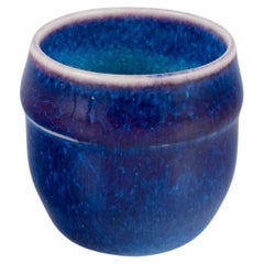 Stig Lindberg for Gustavsberg Studio. Miniature vase with blue-violet glaze