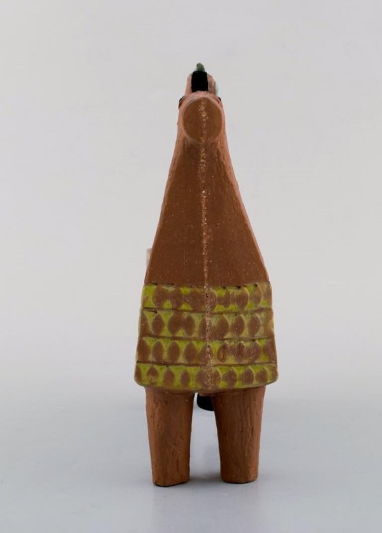 Suédois Stig Lindberg pour Gustavsberg Studio. Rare figurine en céramique représentant un cheval et une jeune fille en vente