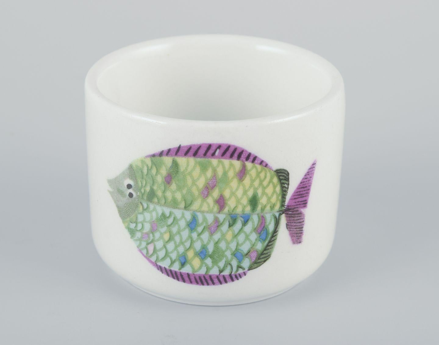 PRE-OWNED GOODS ARE EXEMPT FROM IMPORT TARIFFS FOR U.S., UK, AUSTRALIAN & CANADIAN CUSTOMERS.   
THEREFORE, NO IMPORT TARIFFS WILL BE APPLICABLE TO YOUR PURCHASE. 

Stig Lindberg for Gustavsberg.
Three ‘Pynta’ egg cups and small tray in