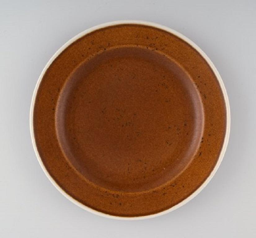 Stig Lindberg for Gustavsberg. Twelve Coq plates. Beautiful glaze in brown shades, 1960s.
Measure: Diameter: 19.8 cm.
In excellent condition.
Stamped.
