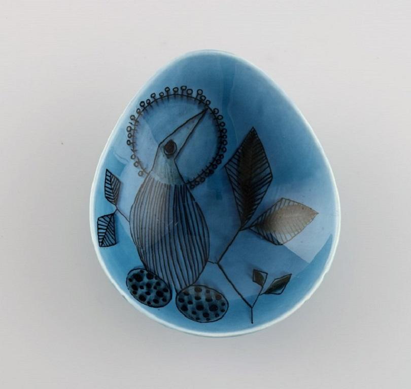 Stig Lindberg for Rörstrand. Three rare bowls in glazed ceramics with hand-painted flowers and birds. 1960s.
Measures: 12 x 4.5 cm.
In excellent condition.
Signed.