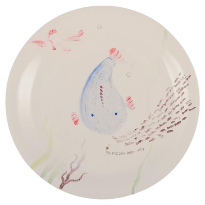 Stig Lindberg, Gustavsberg. "Löja" plate. Hand-painted with a fish motif, 1950s For Sale