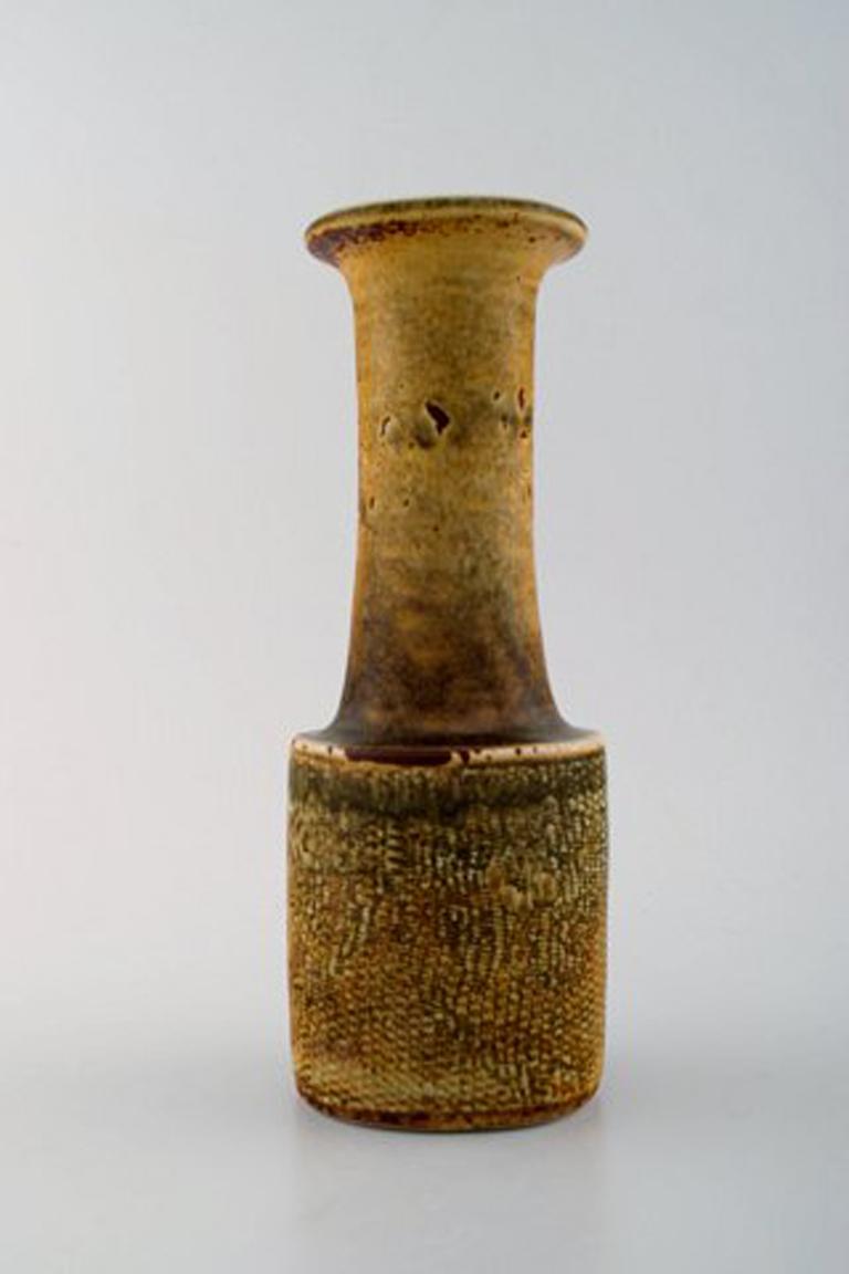 Stig Lindberg (1916-1982), Gustavsberg Studio hand, ceramic vase.
Beautiful glaze in brown and yellow shades.
Measures 22 cm x 8 cm.
In perfect condition.