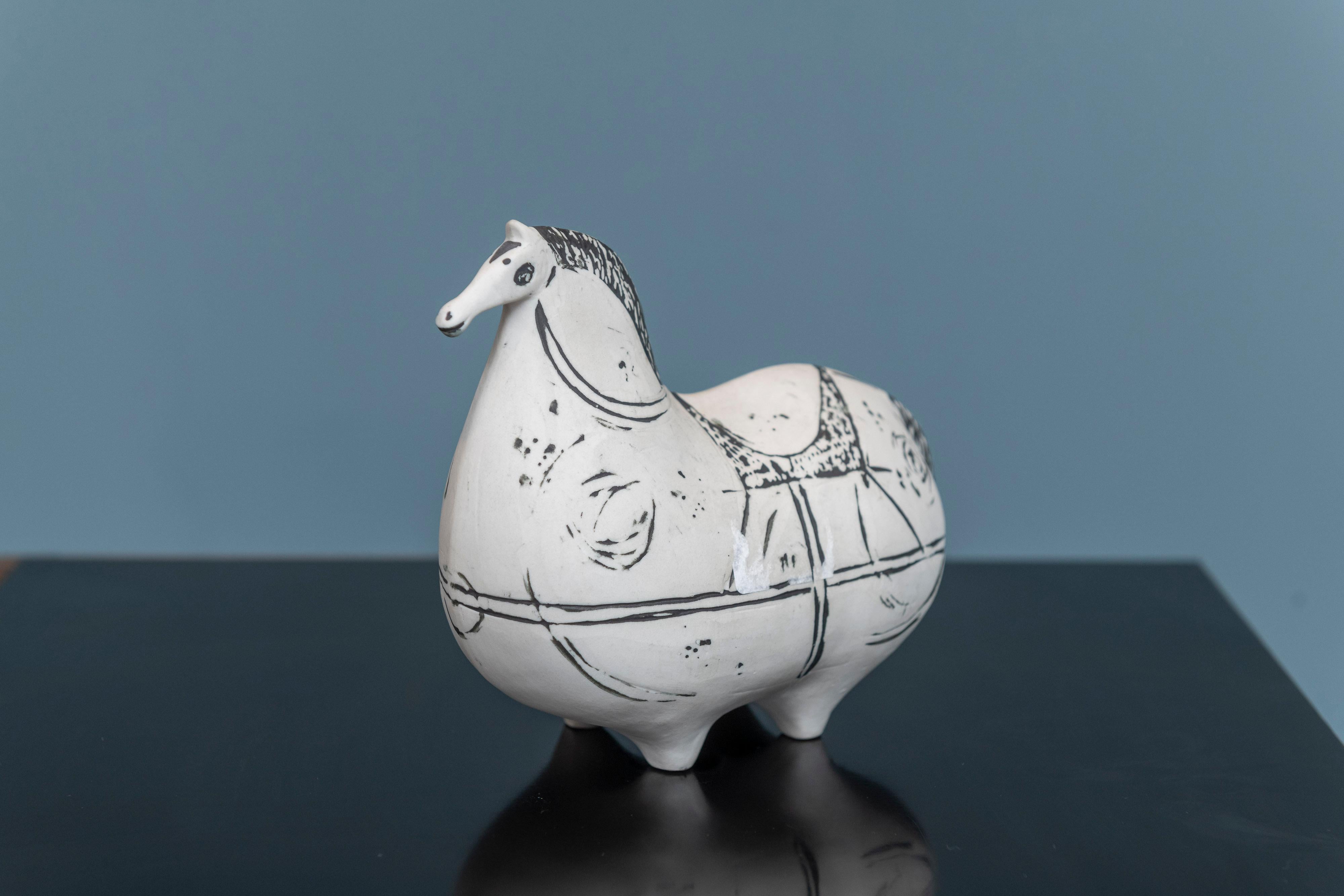 Stig Lindberg design stoneware horse for Gustavberg, Sweden. Elegant looking horse with hand painted decoration, signed and partial label still present. In perfect original condition, ready to enjoy.
