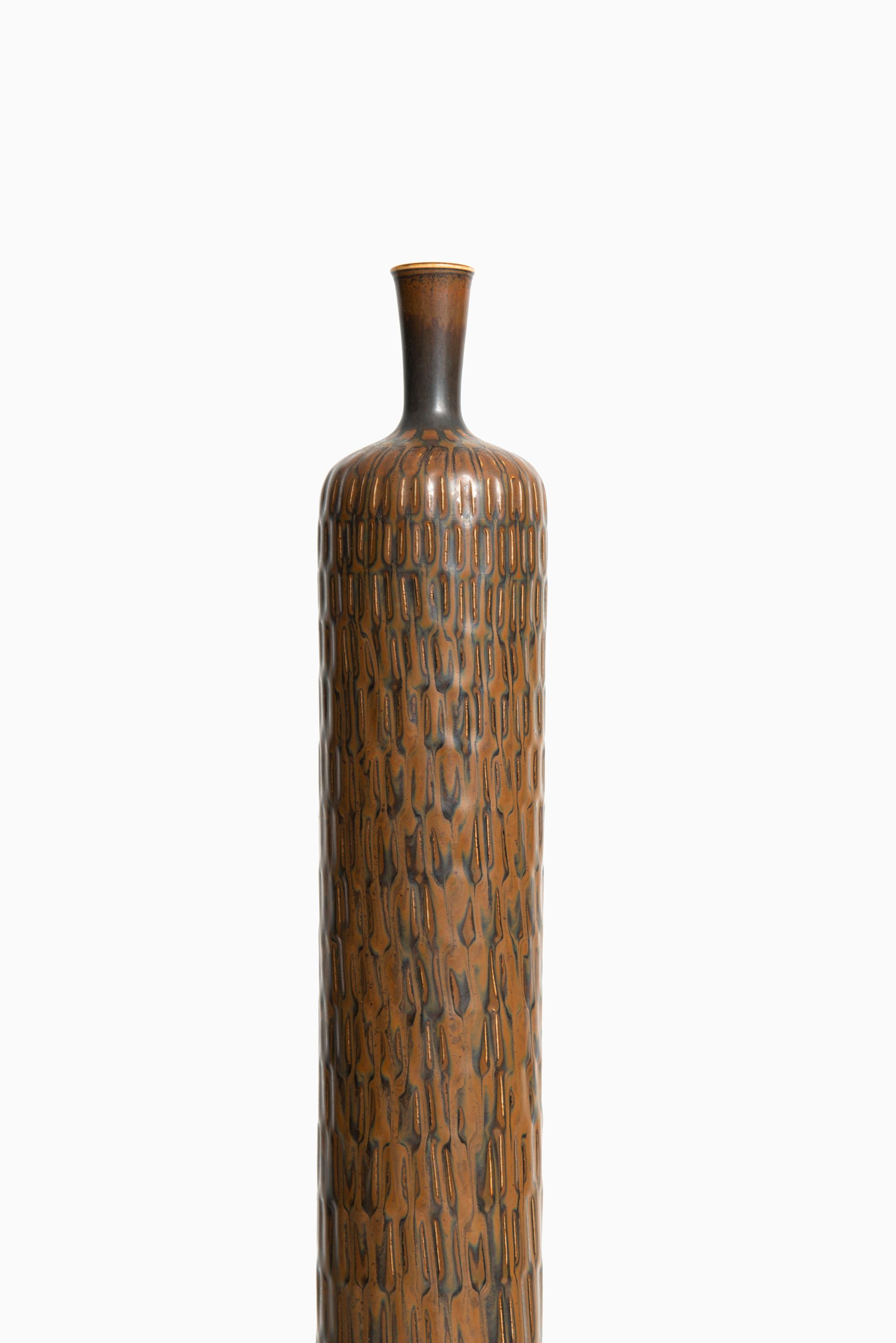 Rare and tall ceramic vase designed by Stig Lindberg. Produced by Gustavsberg in Sweden.