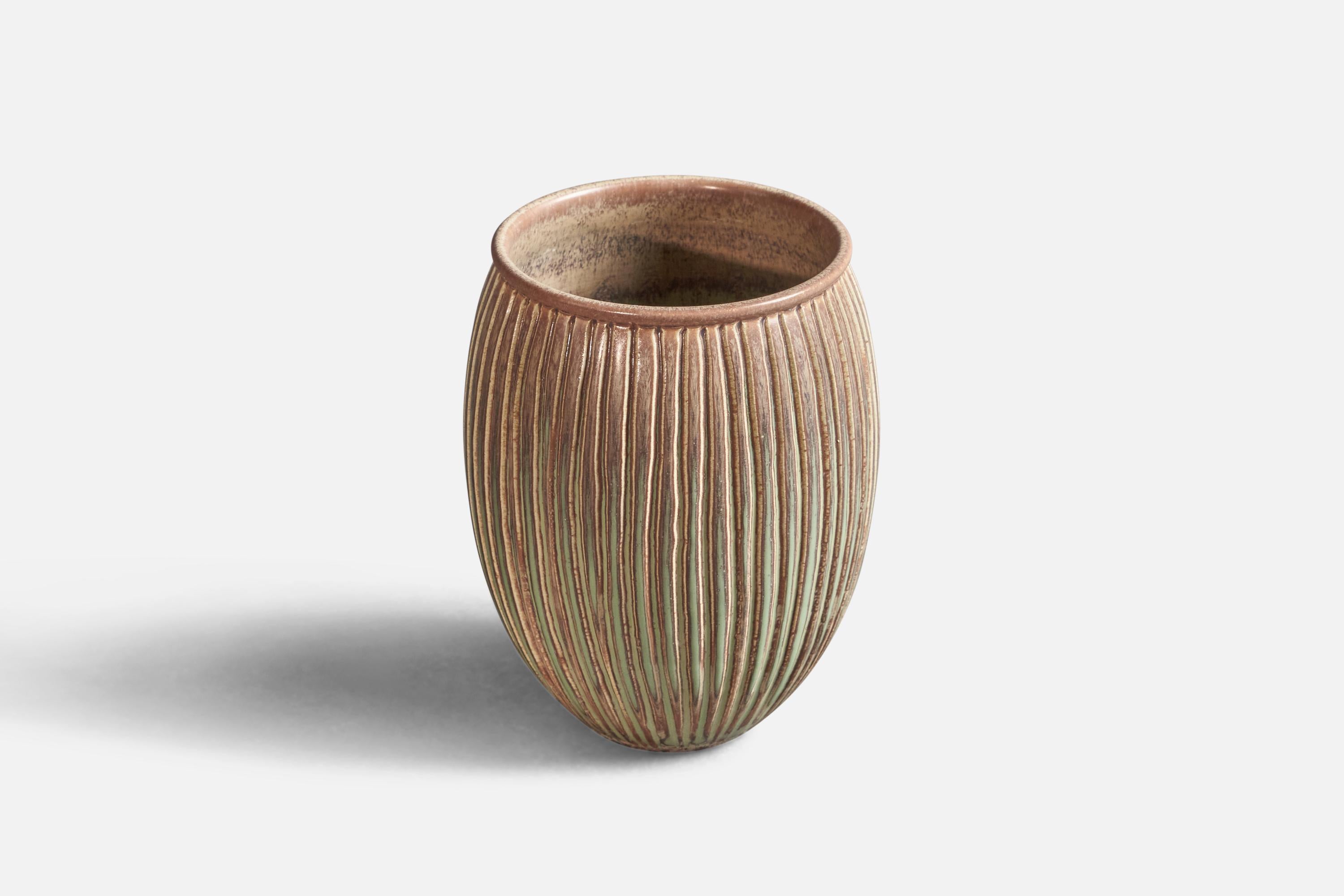 A fluted brown-glazed stoneware vase, designed by Stig Lindberg, produced by Gustavsberg, Sweden, c. 1960s.