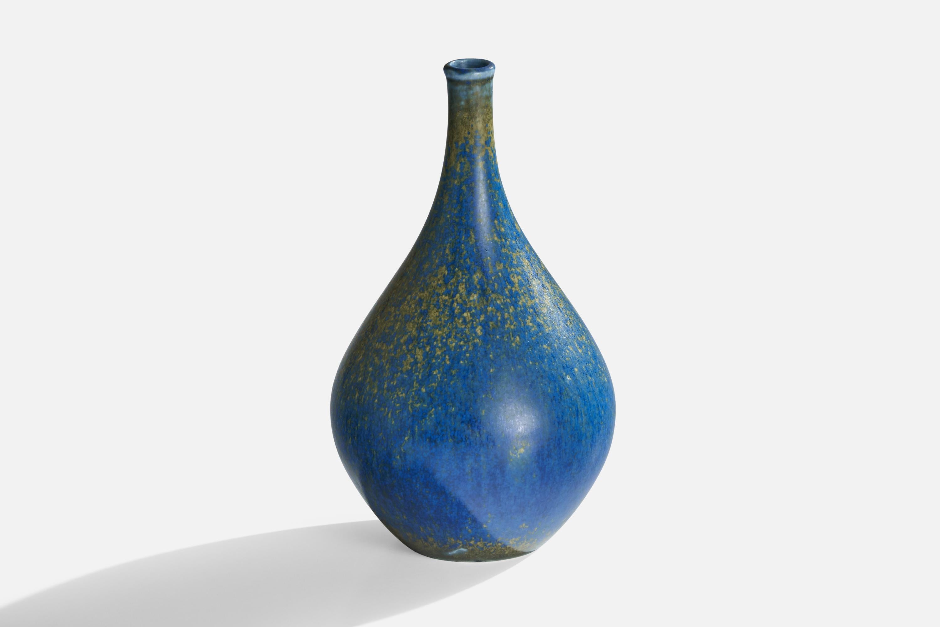 A blue-glazed stoneware 