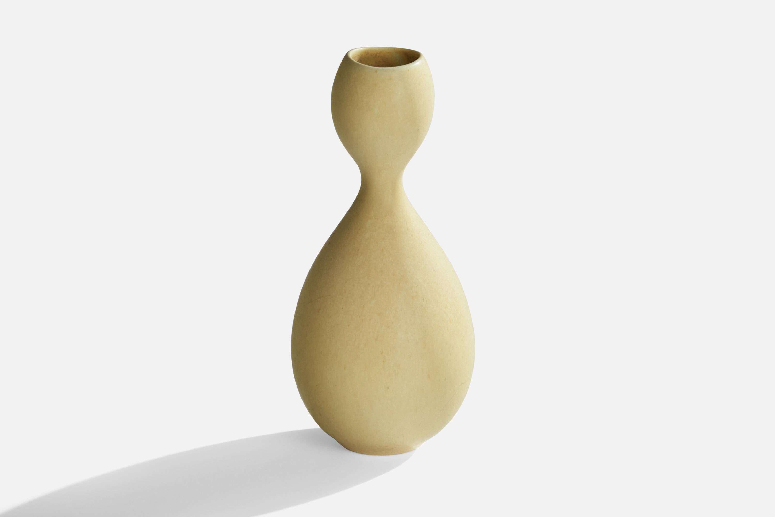 A beige-glazed stoneware 