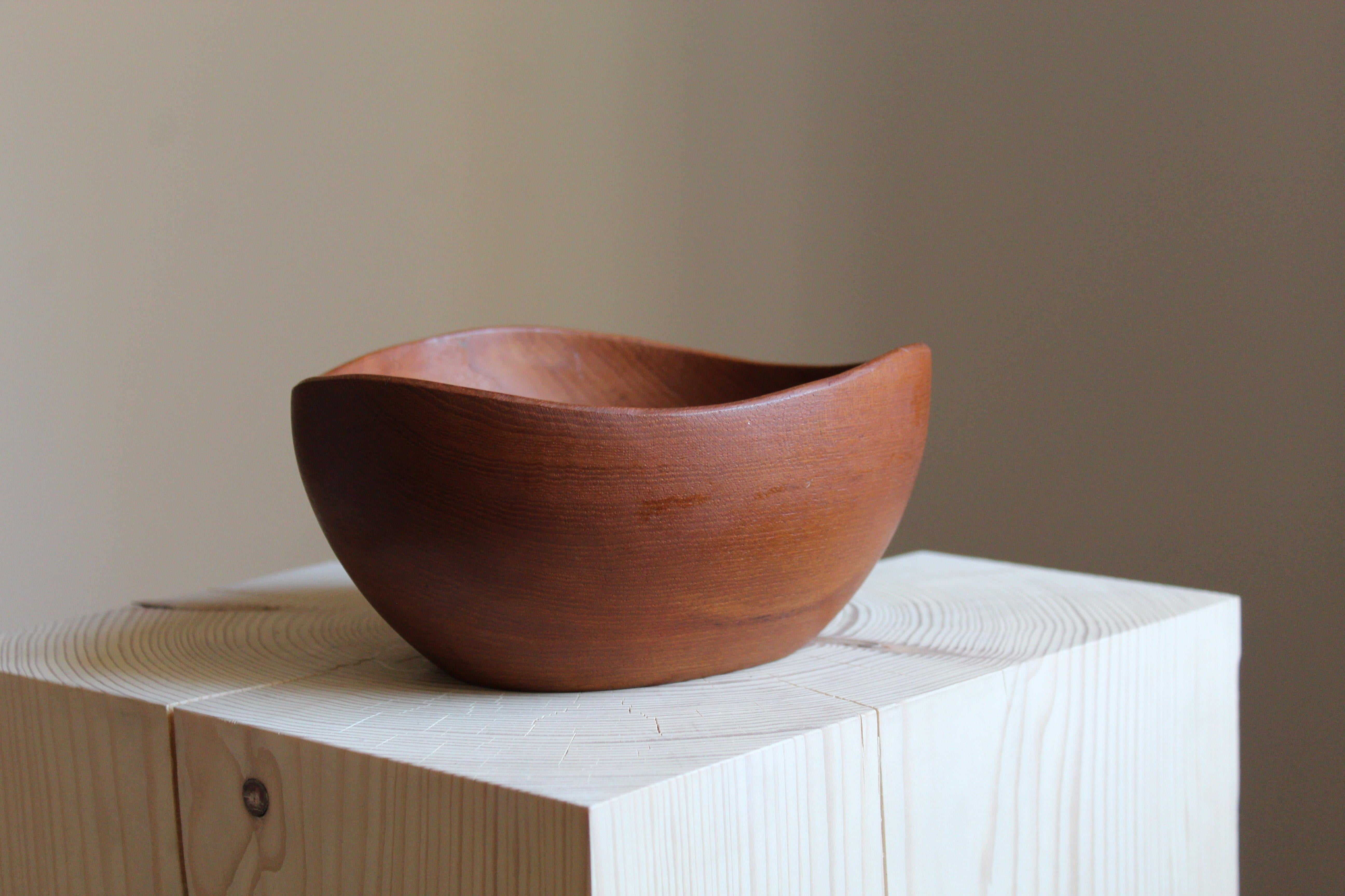 A small bowl or sculpture by Stig Sandberg. Handmade in his studio. Features carved signature and original label.

Other designers of the period include Finn Juhl, Hans Wegner, Kaare Klint, and Alvar Aalto.