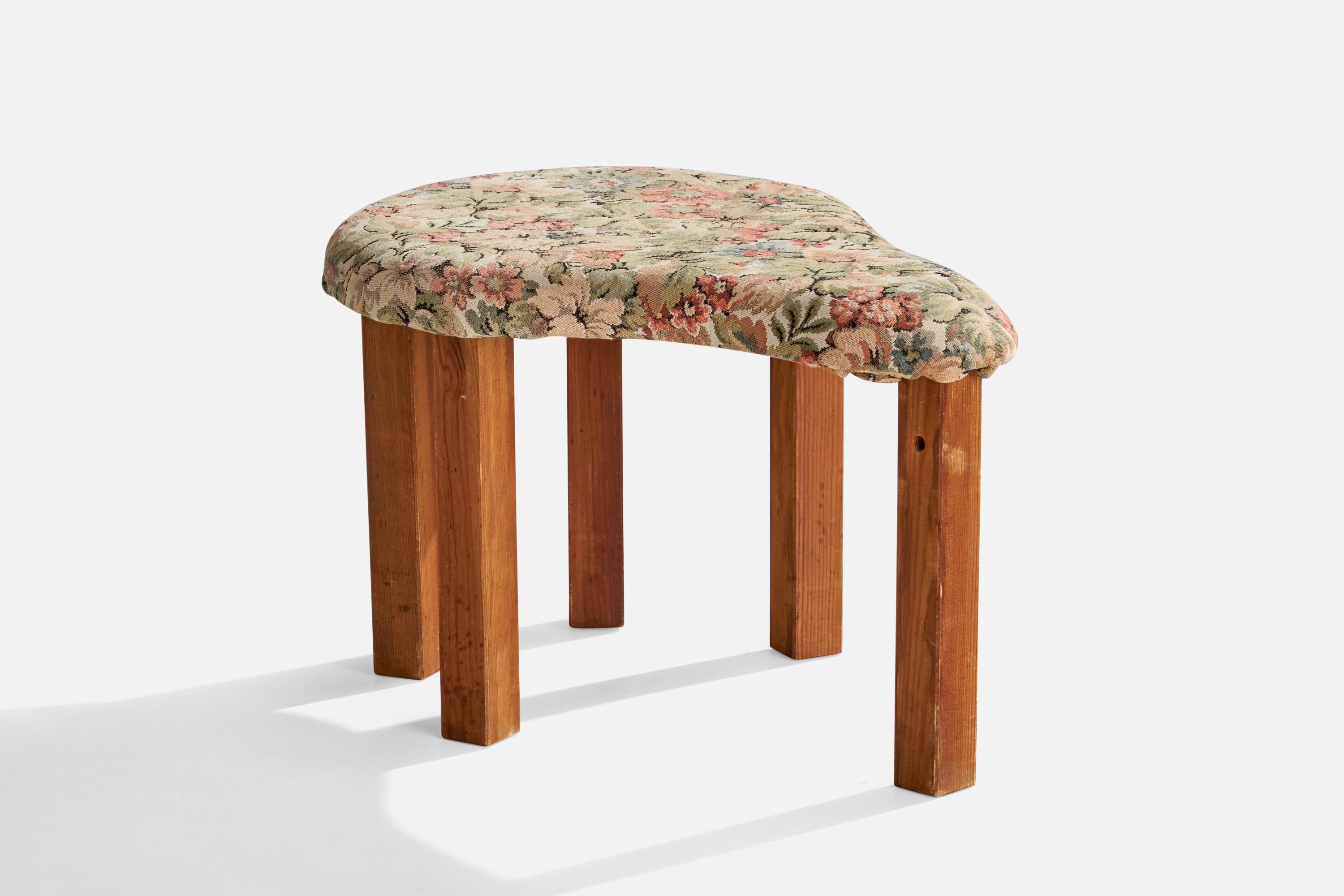 A pine and floral fabric stool designed and produced by Stig Wärnell, Nyköping, Sweden, 1970s.

seat height 13”. 